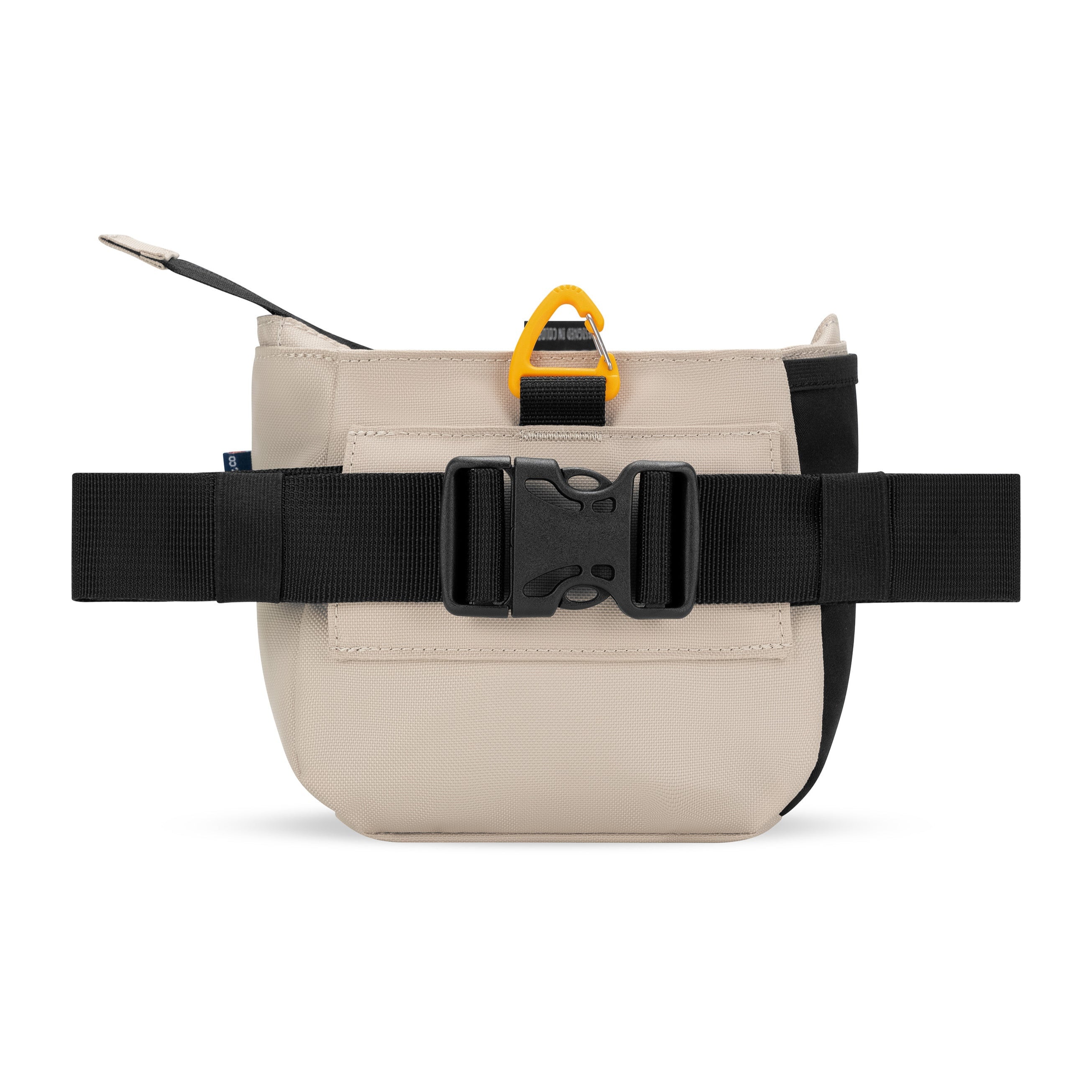 Back view of OllyDog’s Backcountry Day Bag in Con Leche, showcasing the removable belt strap with a plastic buckle. This versatile dog training pouch also includes a convenient clip, making it become one of essential dog walking accessories. #color_con leche