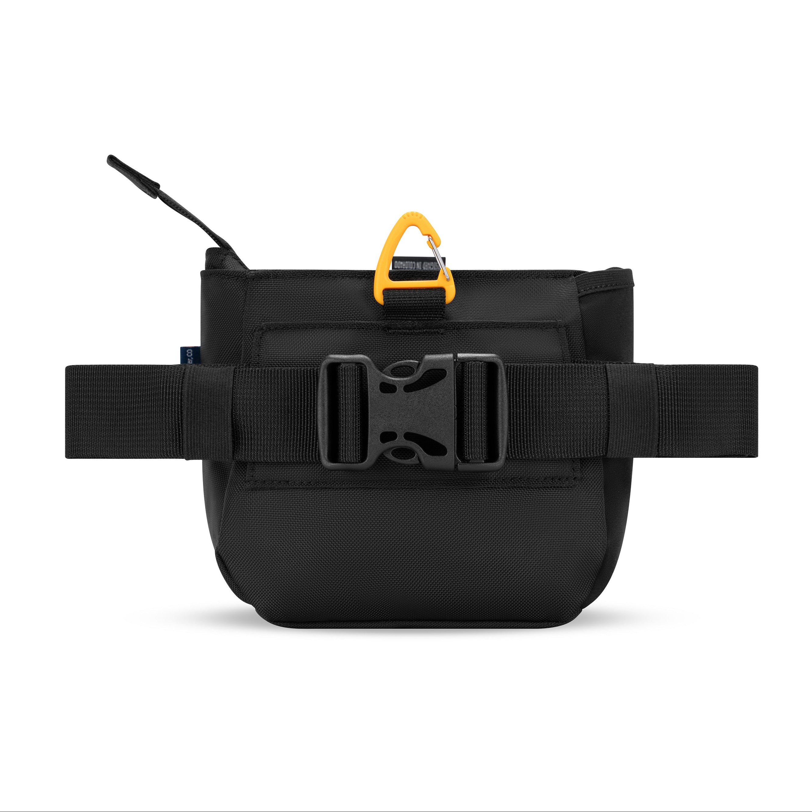 Back view of OllyDog’s Backcountry Day Bag in Raven S'25, showcasing the removable belt strap with a plastic buckle. This versatile dog training pouch also includes a convenient clip, making it become one of essential dog walking accessories. #color_raven s'25