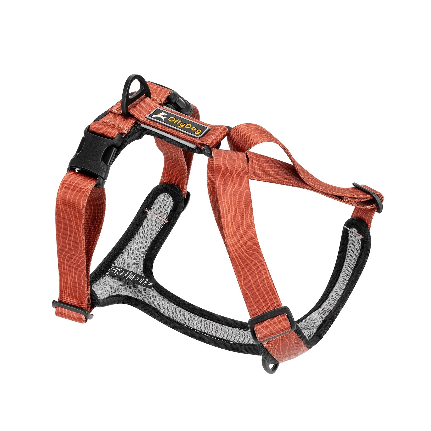 OllyDog Alpine Reflective Comfort Harness in Clay color with woodgrain pattern, featuring padded mesh lining, adjustable straps, and aluminum D-rings, shown in a flat front-facing view #color_clay woodgrain