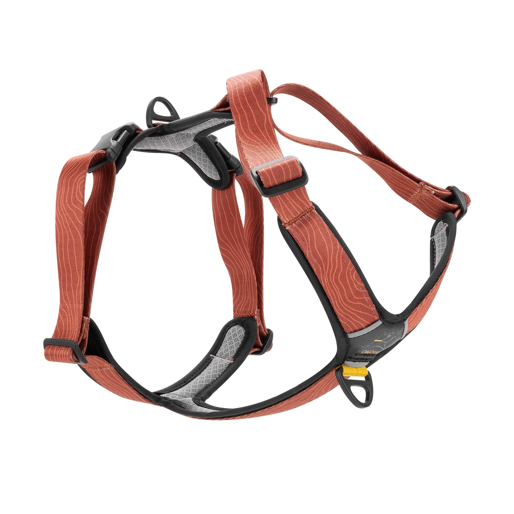 Side view of OllyDog Alpine Reflective Comfort Harness in Clay color with woodgrain pattern, showing padded breathable mesh lining, adjustable straps, sturdy aluminum D-rings, and durable plastic hardware #color_clay woodgrain