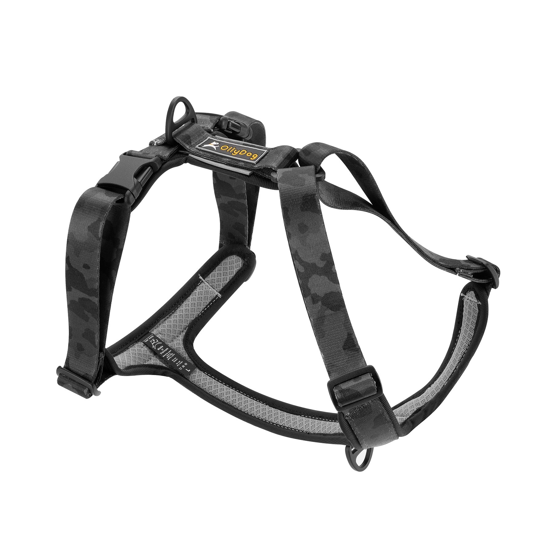 OllyDog Alpine Reflective Comfort Harness in Dream Camo color, displayed on a white background. The harness features a black and gray camo pattern with adjustable padded straps, durable buckle, and reflective safety trim #color_dream camo