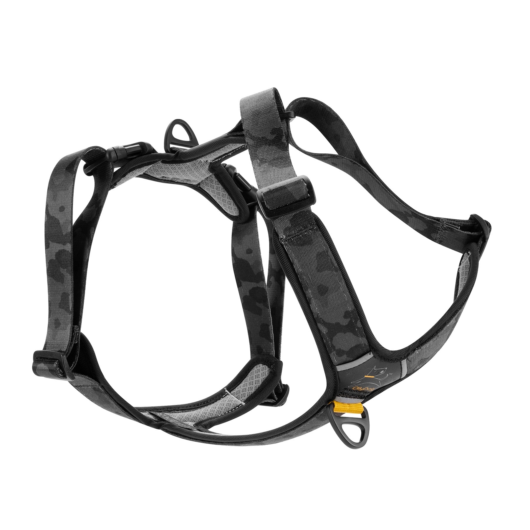 OllyDog Alpine Reflective Comfort Harness in Dream Camo color, displayed on a white background. The harness features a black and gray camo pattern with adjustable padded straps, durable buckle, and reflective safety trim #color_dream camo