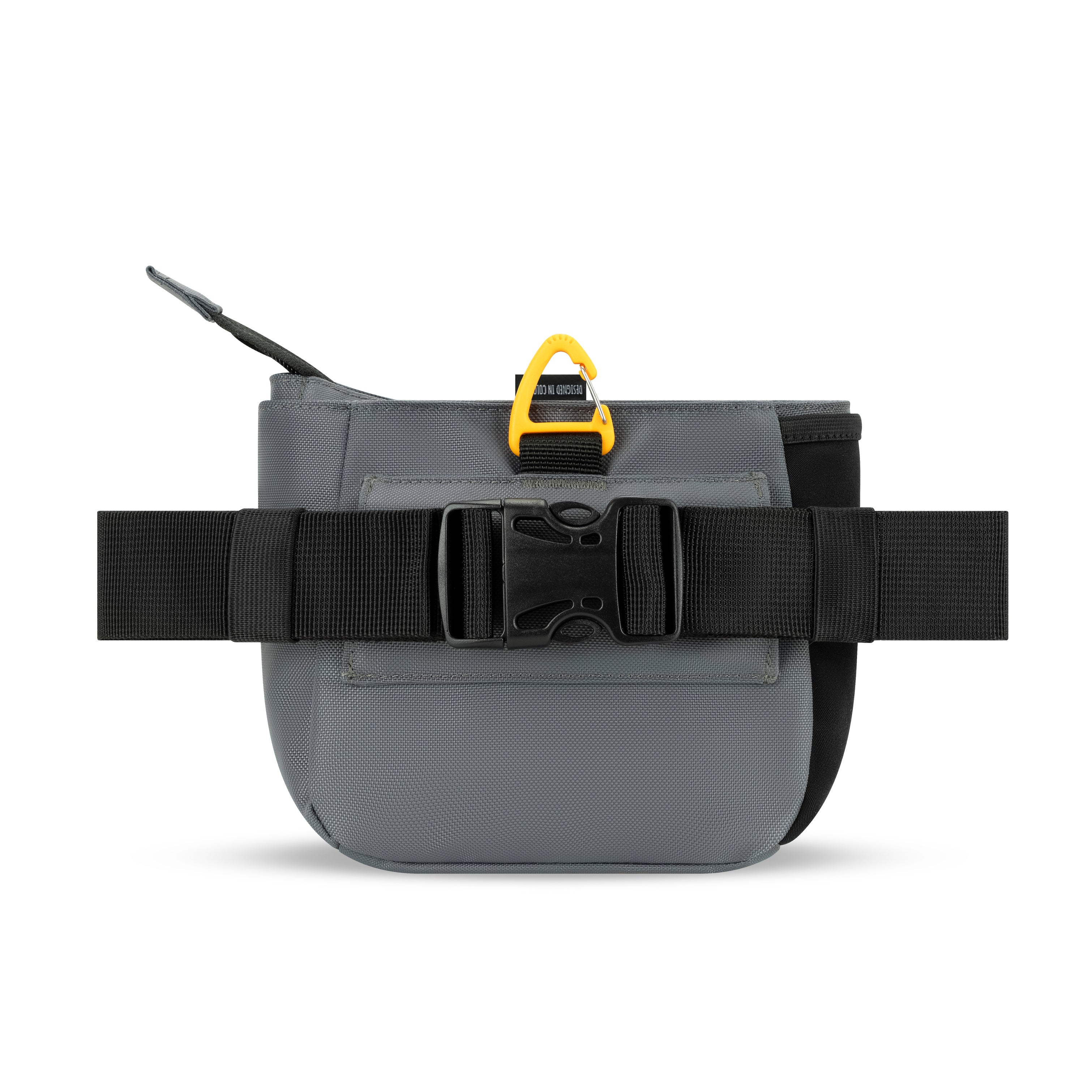 Back view of the OllyDog Backcountry Day Bag in Castle Rock, showing adjustable black waist strap with secure buckle and yellow clip #color_castle rock