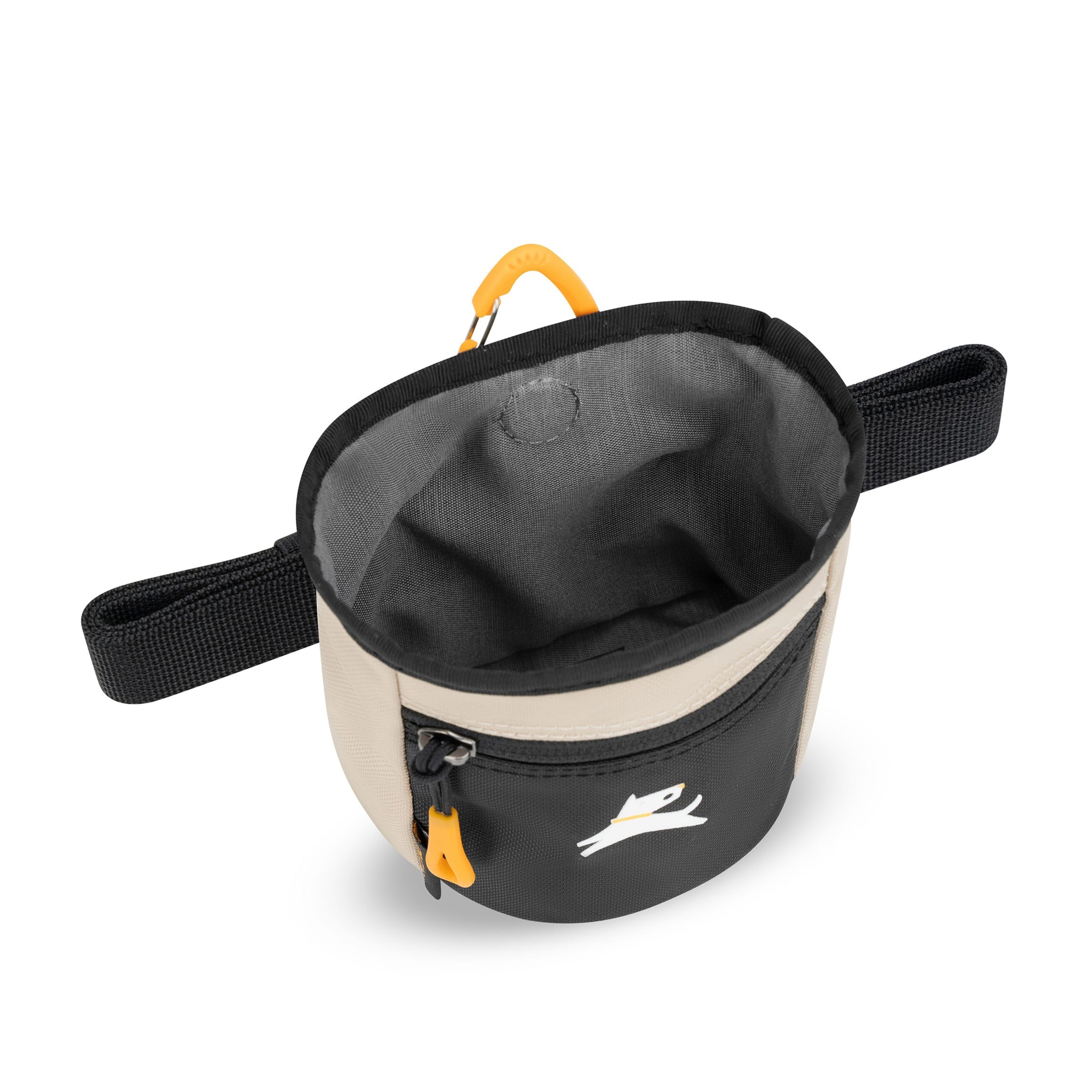 Top-down view of a two-tone dog treat pouch in black and beige with a yellow zipper pull, open to show the spacious interior. Features side loops and front zipper pocket with a white dog logo #color_con leche