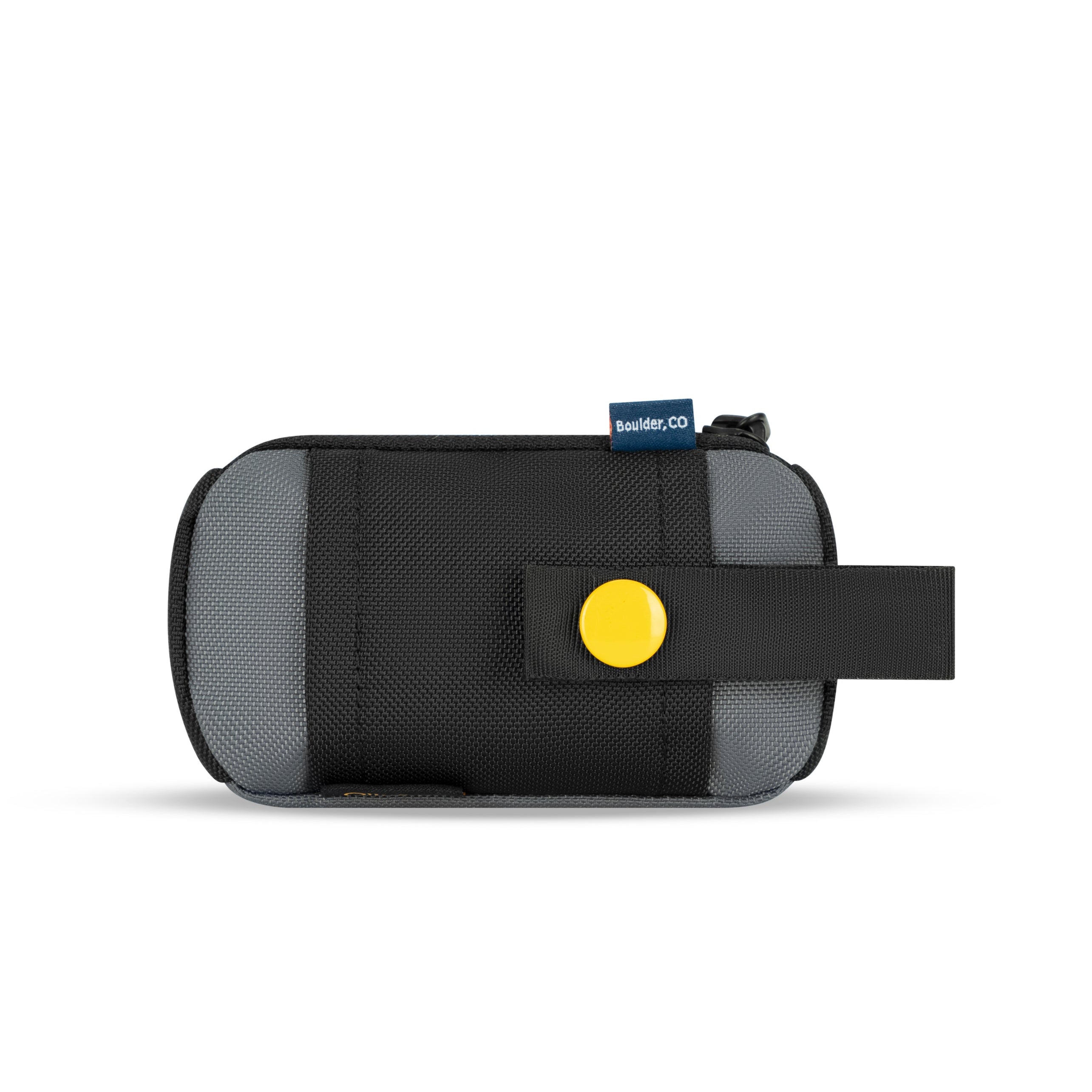 Back view of the OllyDog Scoop Pick Up Bag in Castle Rock color featuring snap-button strap for leash or belt attachment #color_castle rock