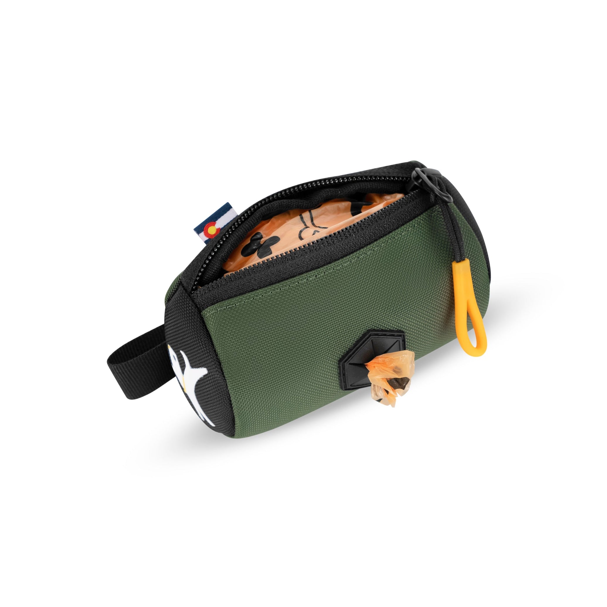 Interior view of the OllyDog Scoop Pick Up Bag in Winter Moss color showing waste bag roll loaded for easy dispensing #color_winter moss