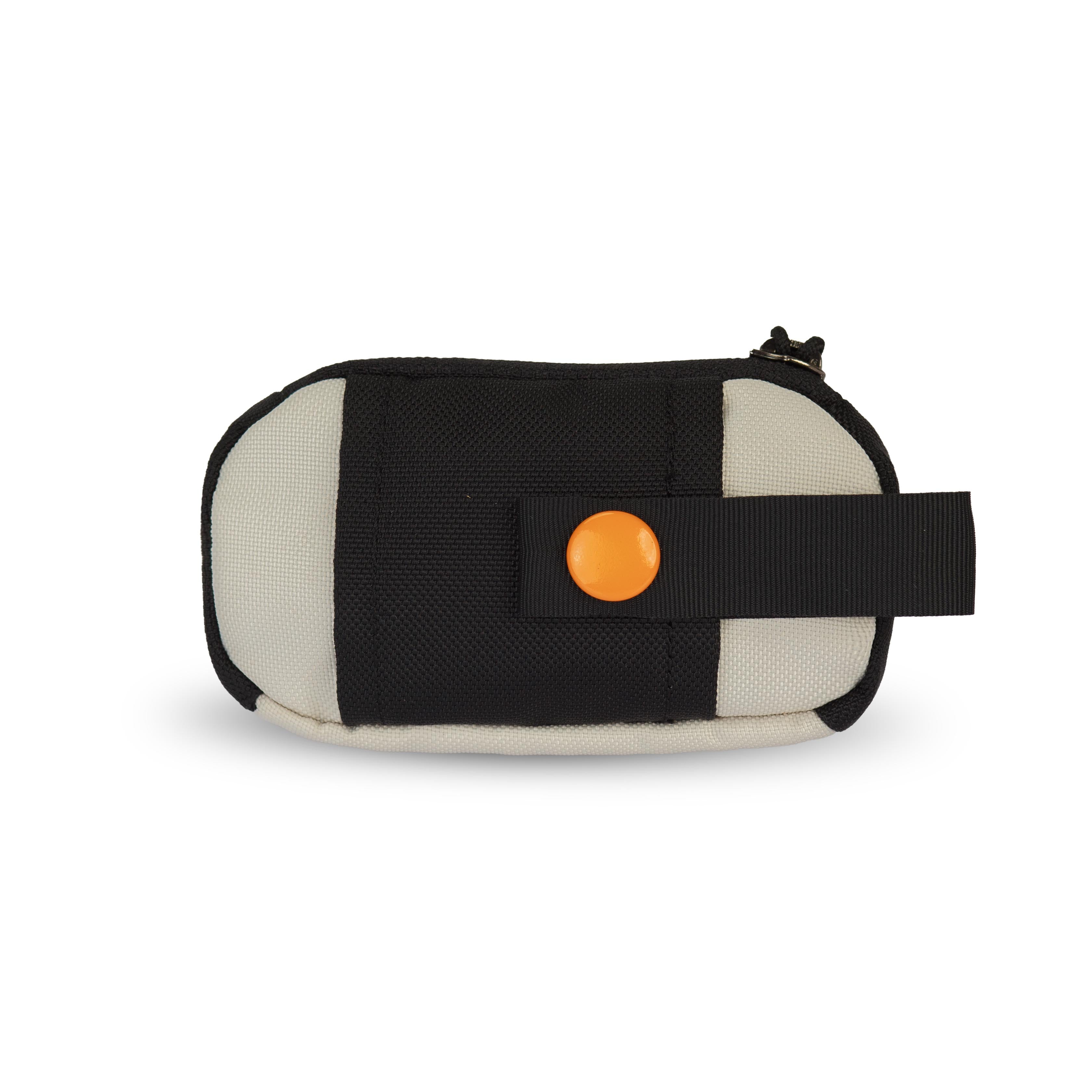 Back view of the Scoop Pick Up Bag in Bluff. This doggy waste bag holder features a snap button for easy attachment to a leash or any location, serving as a practical poop bag dispenser for dog owners. #color_bluff