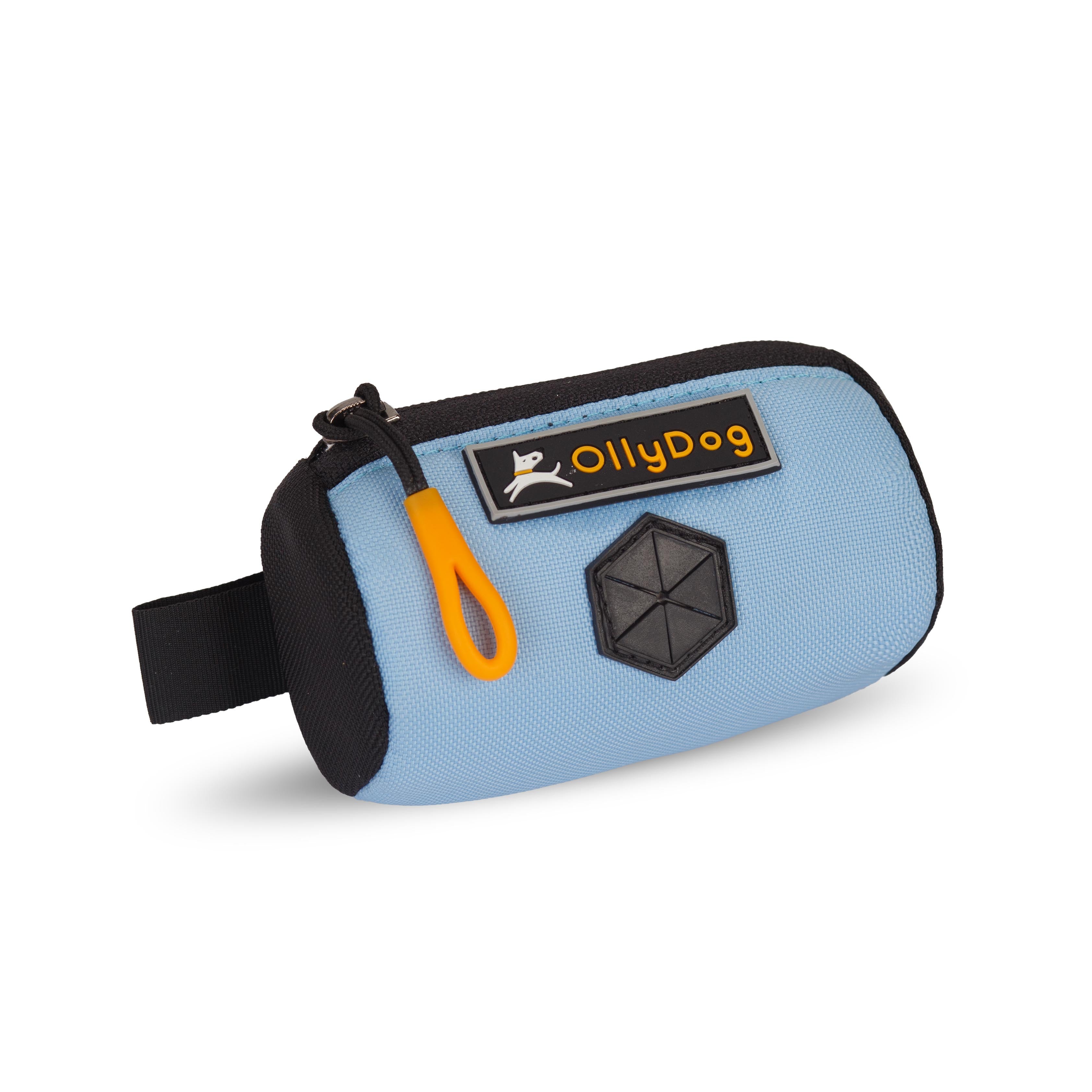 Angled front view of OllyDog’s Scoop Pick Up Bag in Maui Blue. This poop bag dispenser features a zipper closure and a snap button for quick attachment to a belt loop, making it a handy doggie bag holder for leash. The rubber dispensing cover ensures easy access to dog waste bags. #color_maui blue