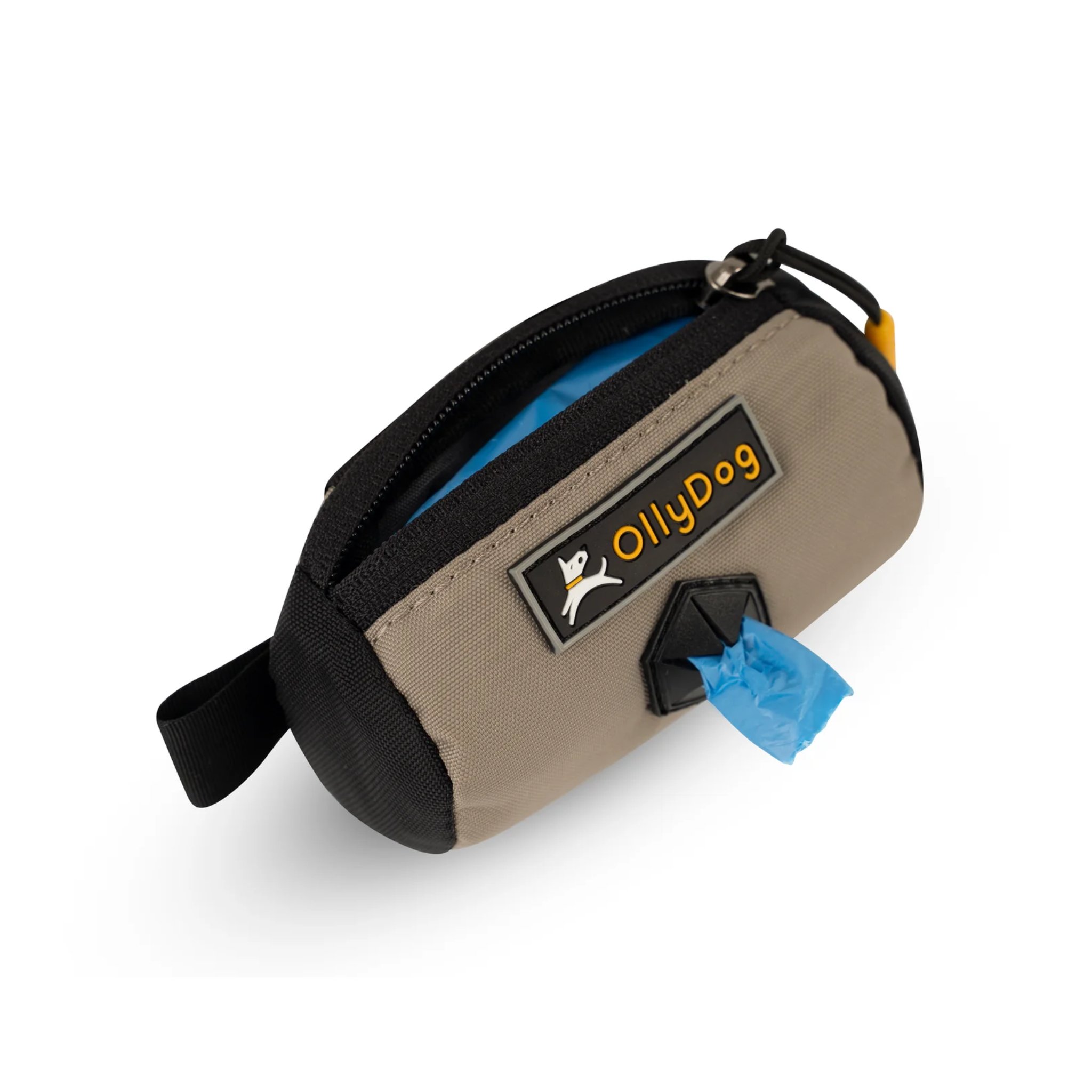 Opened view of the Scoop Pick Up Bag in Champagne. This doggy waste bag holder serves as a convenient poop bag dispenser, allowing quick access to dog poop bags on the go. The small compartment can hold standard bag rolls, keys, or a lipstick, making it a versatile doggie bag holder for leash. #color_champagne