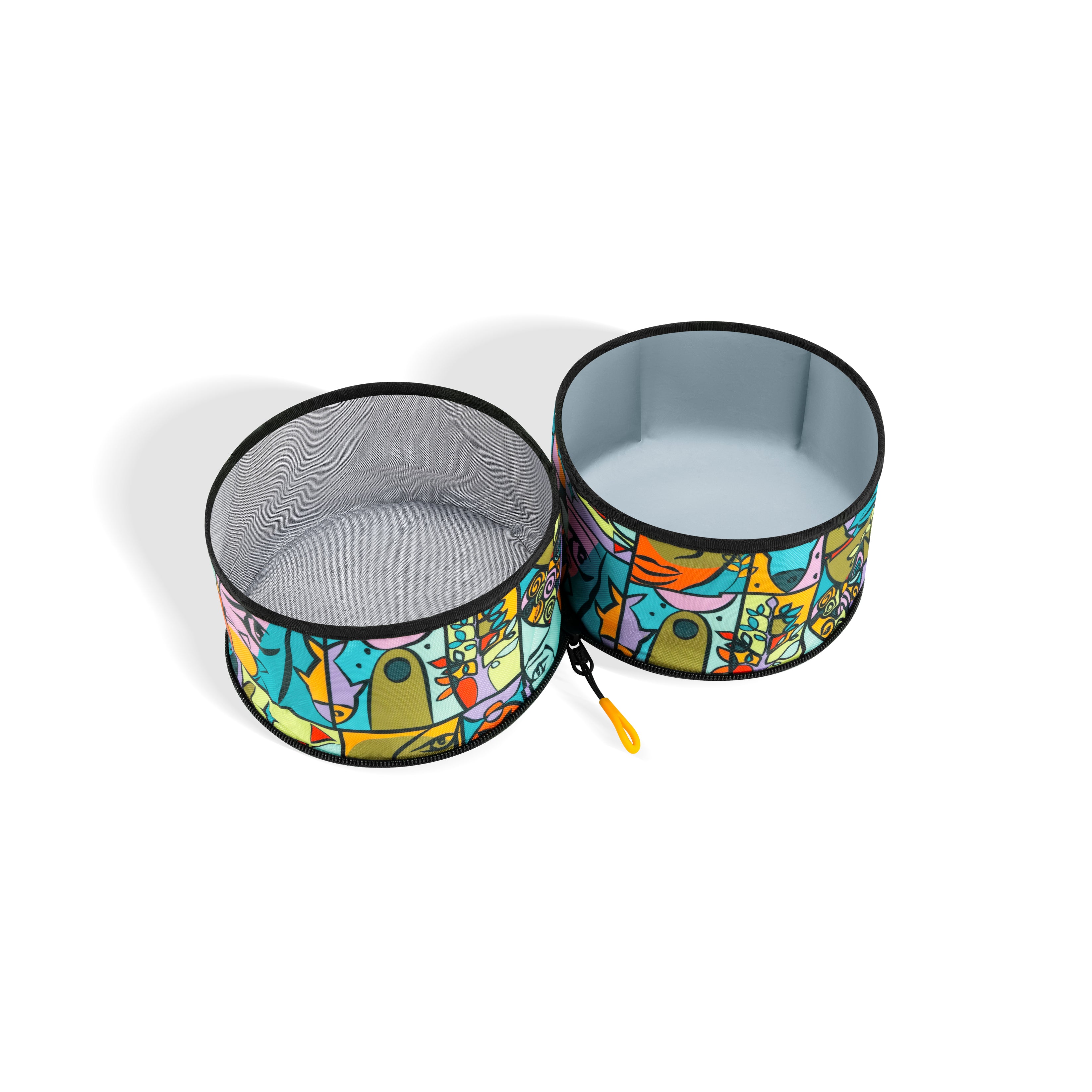 OllyDog Superbowl in Cloud9 pattern shown open with two empty bowls for dog food and water, colorful and travel-ready design #color_cloud9