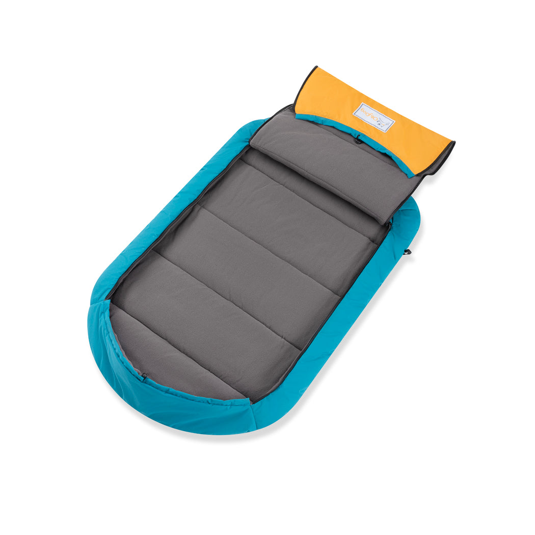 OllyDog Meeker Sleeping Bag for dogs with soft gray fleece lining and teal outer shell, shown fully unzipped for easy entry. Lightweight, water-resistant, ideal for camping and outdoor adventures, featuring a foldable design