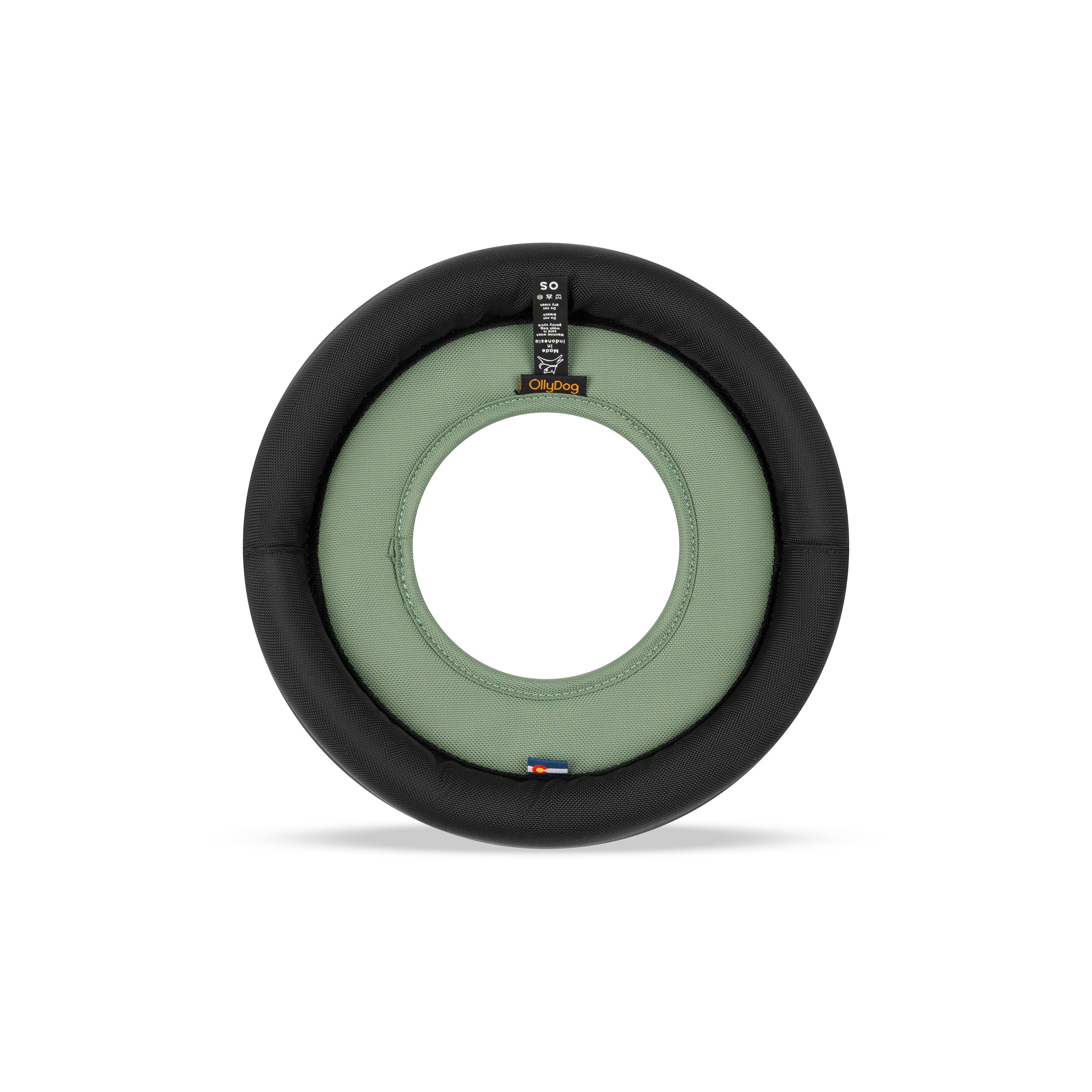 Back view of the OllyDog Mini Super Flyer dog flying disc in olivine green color, highlighting the durable recycled polyester construction and branding details. #color_olivine