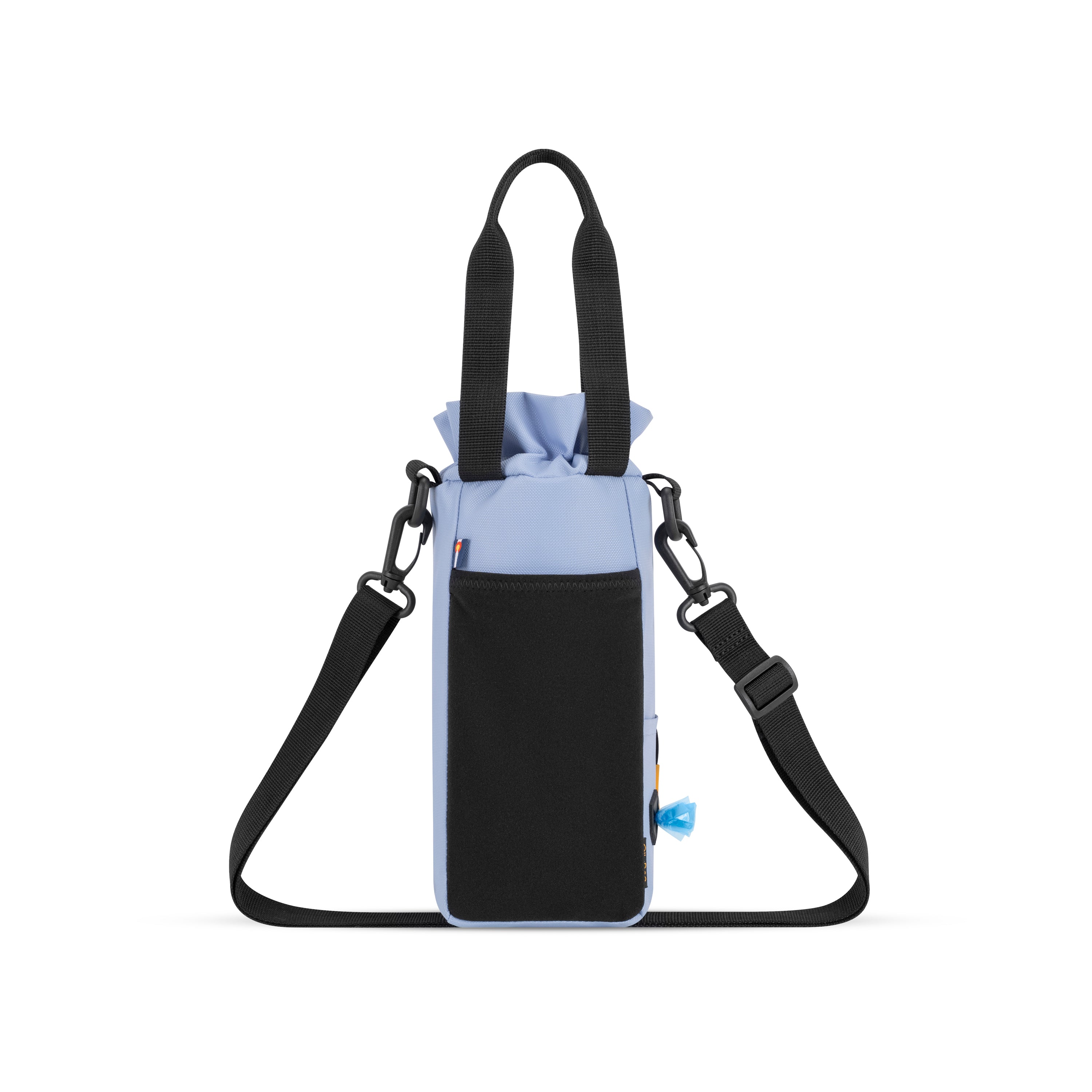 Back view of the OllyDog OllyCaddy dog walking carryall in Blue Heron color, highlighting the convenient back stretch pocket, built-in waste bag dispenser, grip handles, and adjustable crossbody strap. #color_blue heron
