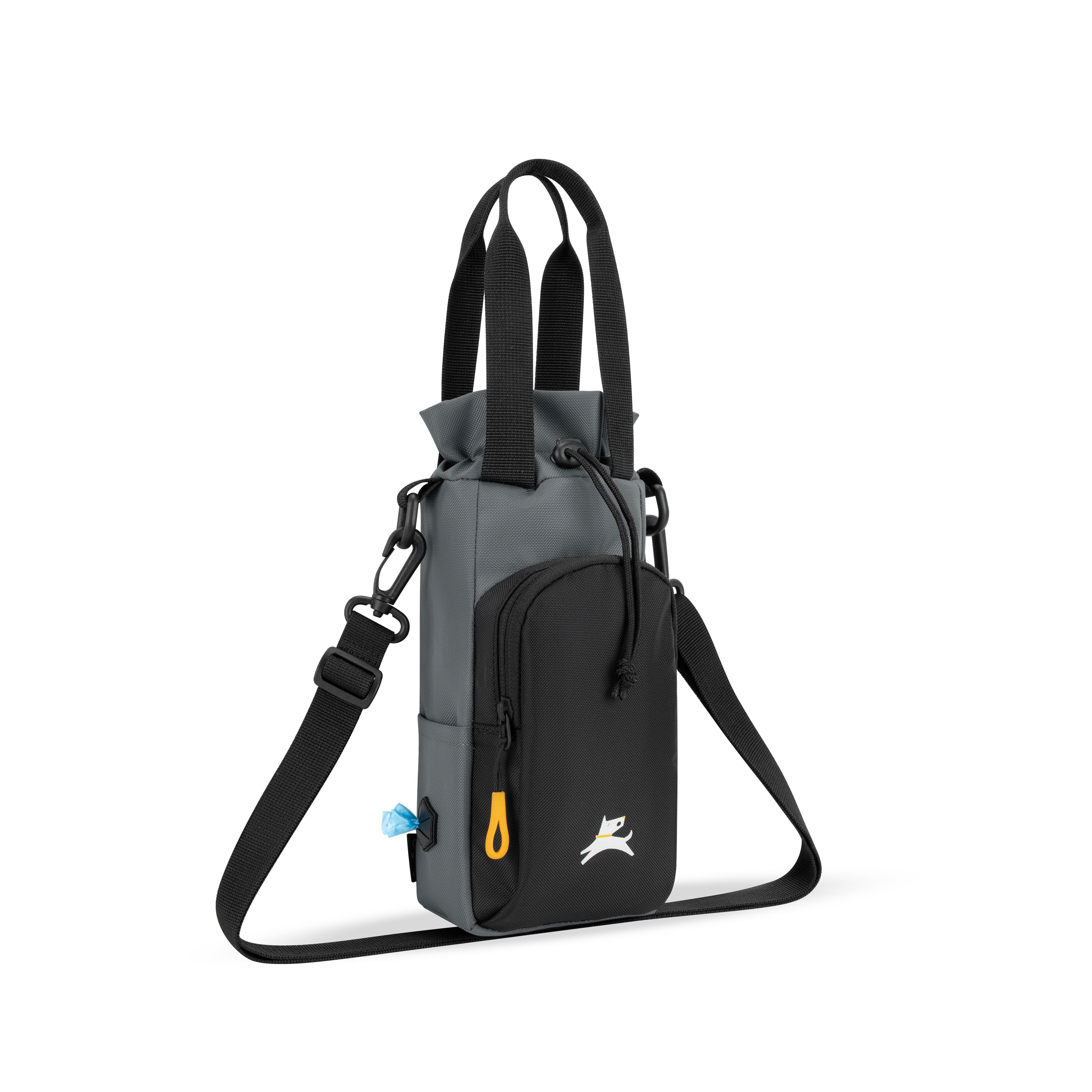 OllyDog OllyCaddy dog walking carryall in castle rock, showcasing the side-mounted waste bag dispenser, front treat pocket, and adjustable crossbody strap. #color_castle rock