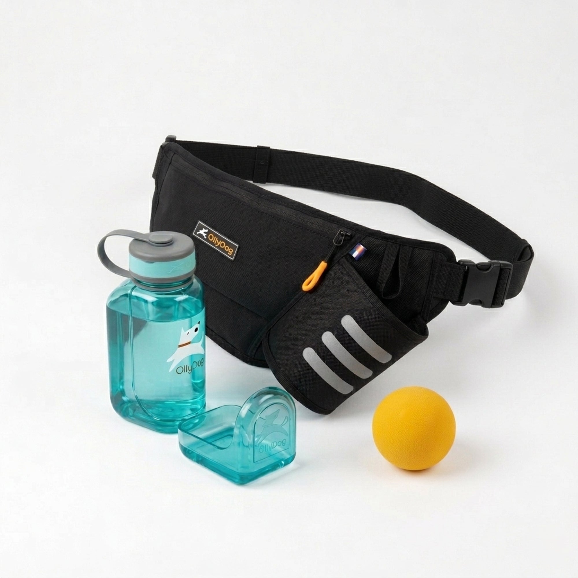 OllyDog dog walking bundle featuring a Raven black Hydro-Slim fanny pack, a teal blue portable OllyBottle with an integrated drinking bowl, and a yellow rubber Happy Camper ball