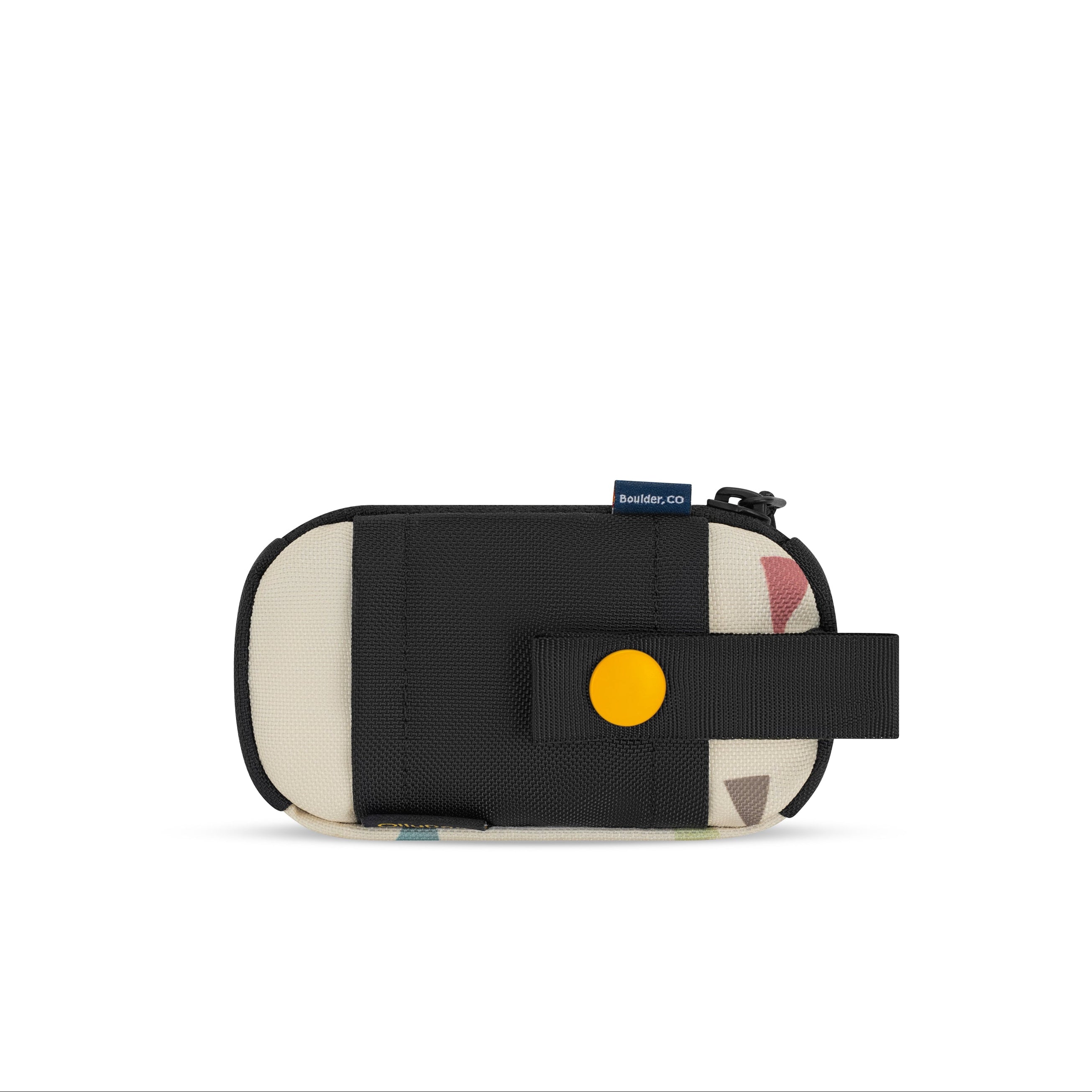 Back view of the OllyDog Scoop Pick Up Bag in terrazzo print color, highlighting the snap closure and slide-on attachment loop for easy attachment to any leash. #color_terrazzo