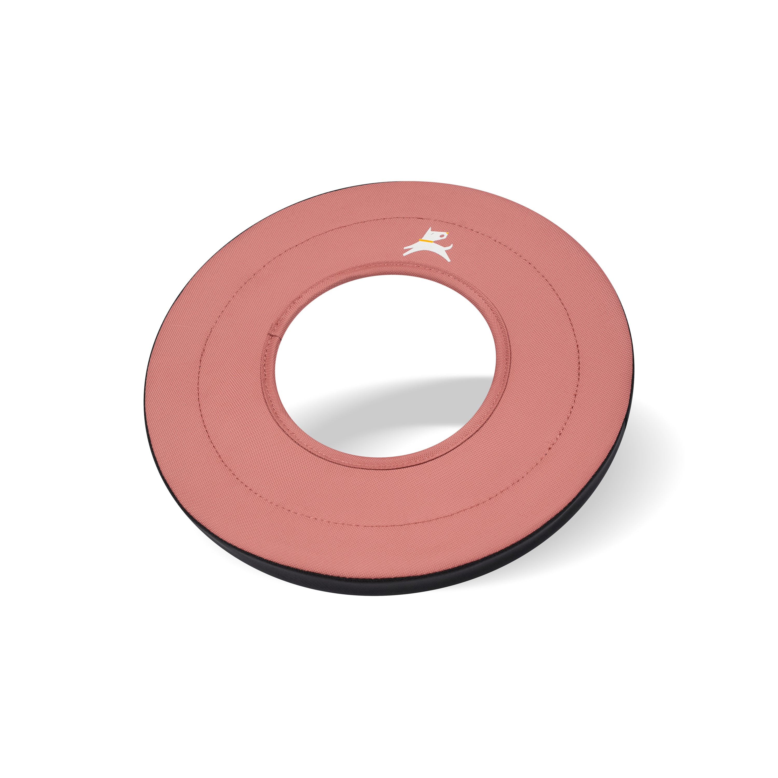 Side-angle view of the OllyDog Super Flyer dog flying disc in desert color, highlighting its lightweight, easy-to-grab, and water-compatible recycled polyester design.#color_desert
