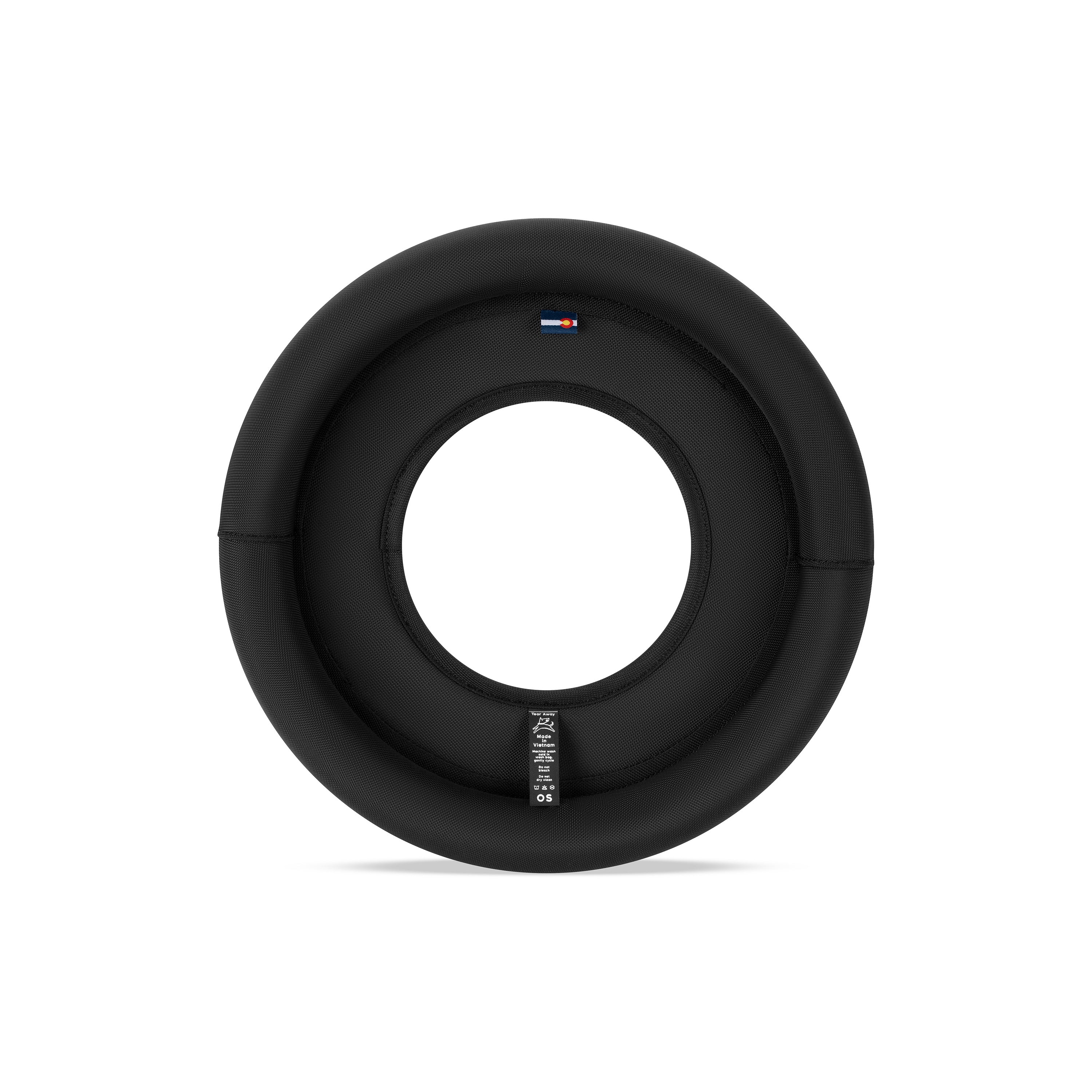 Back view of the OllyDog Super Flyer fabric dog frisbee in Raven black, featuring black trim and product tag at the base #color_raven