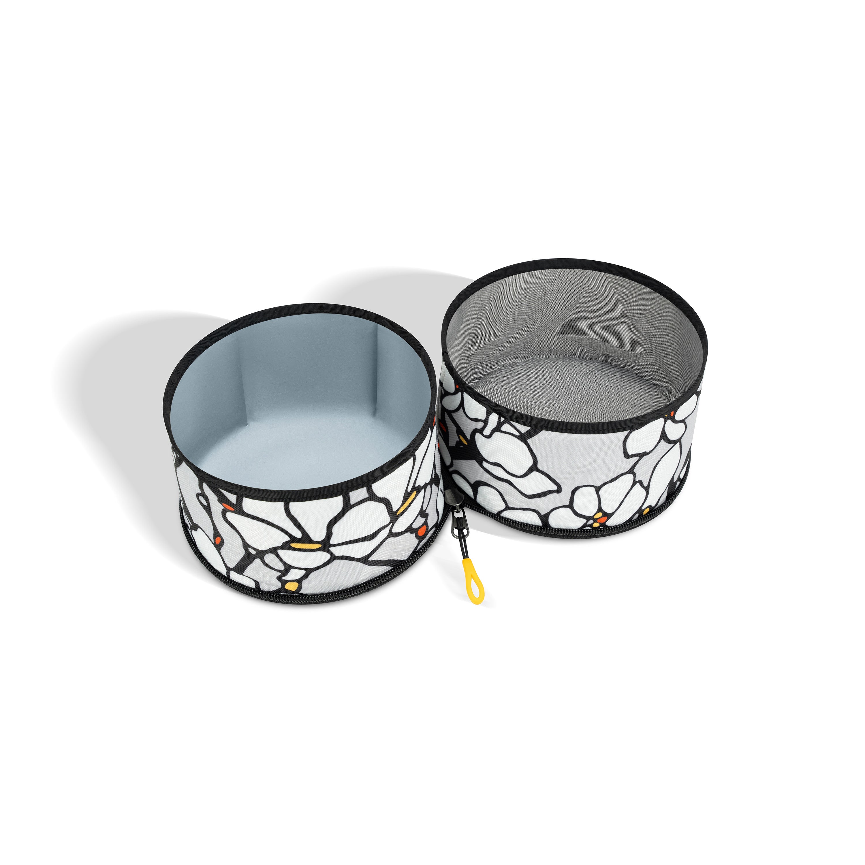 OllyDog Superbowl in Magnolia print with two collapsible compartments for food and water, shown open and empty to display interior and structure #color_magnolia