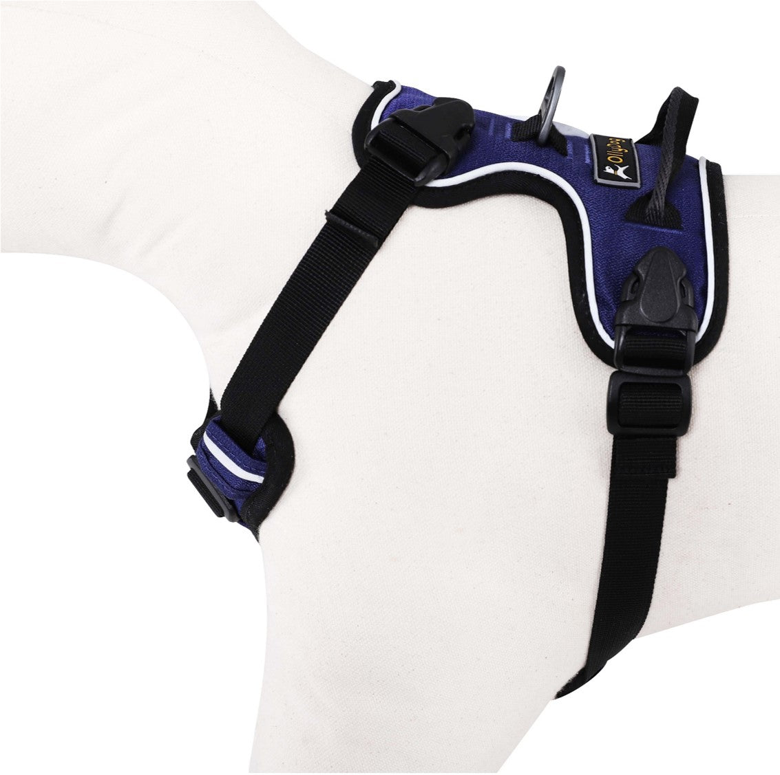 Side-angle view of a mannequin wearing the OllyDog Alpine Reflective Harness in atlantic blue, highlighting the adjustable plastic buckles, brand logo label, reflective piping, and breathable padded lining made from recycled materials. #color_atlantic