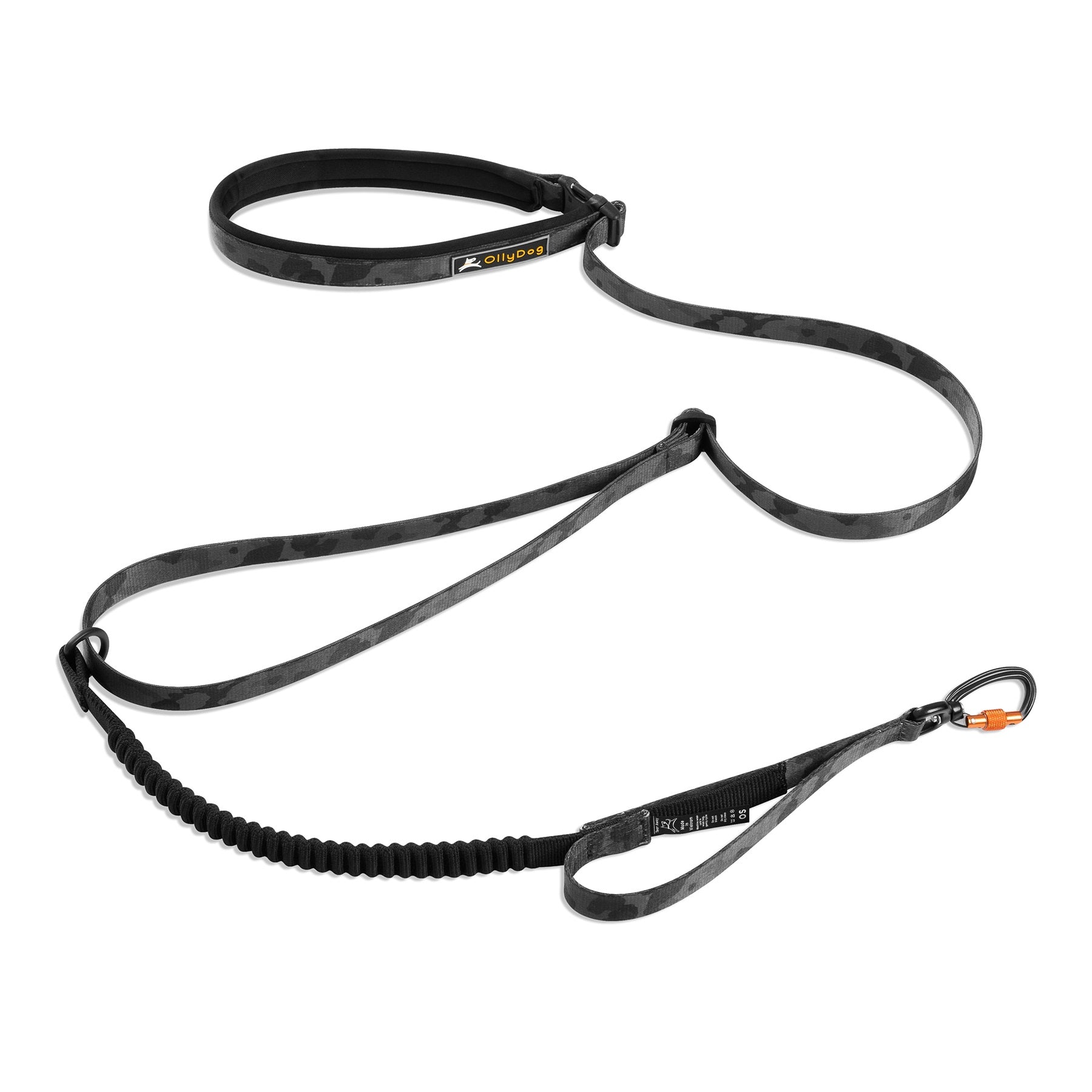 Close-up of the OllyDog Flagstaff Adjustable Spring Leash in a dream camo (black and gray) pattern, showcasing its black padded handle, bungee section for flexible walking, and a silver carabiner hook for secure attachment. This leash is designed for comfortable, hands-free dog walking and running #color_dream camo