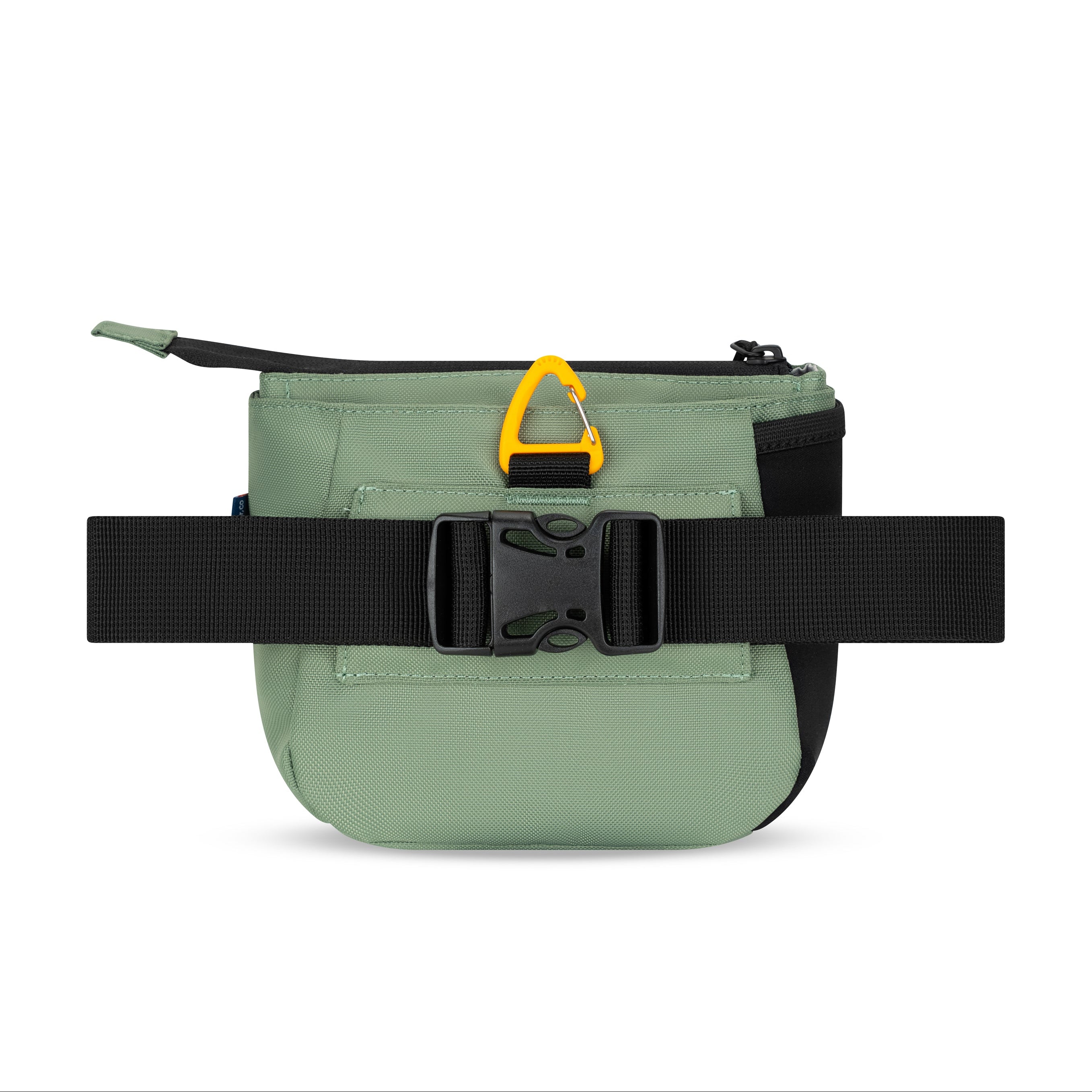 Back view of the OllyDog Backcountry Day Bag in olivine green color showcasing the quick-release buckle and removable waist belt. #color_olivine