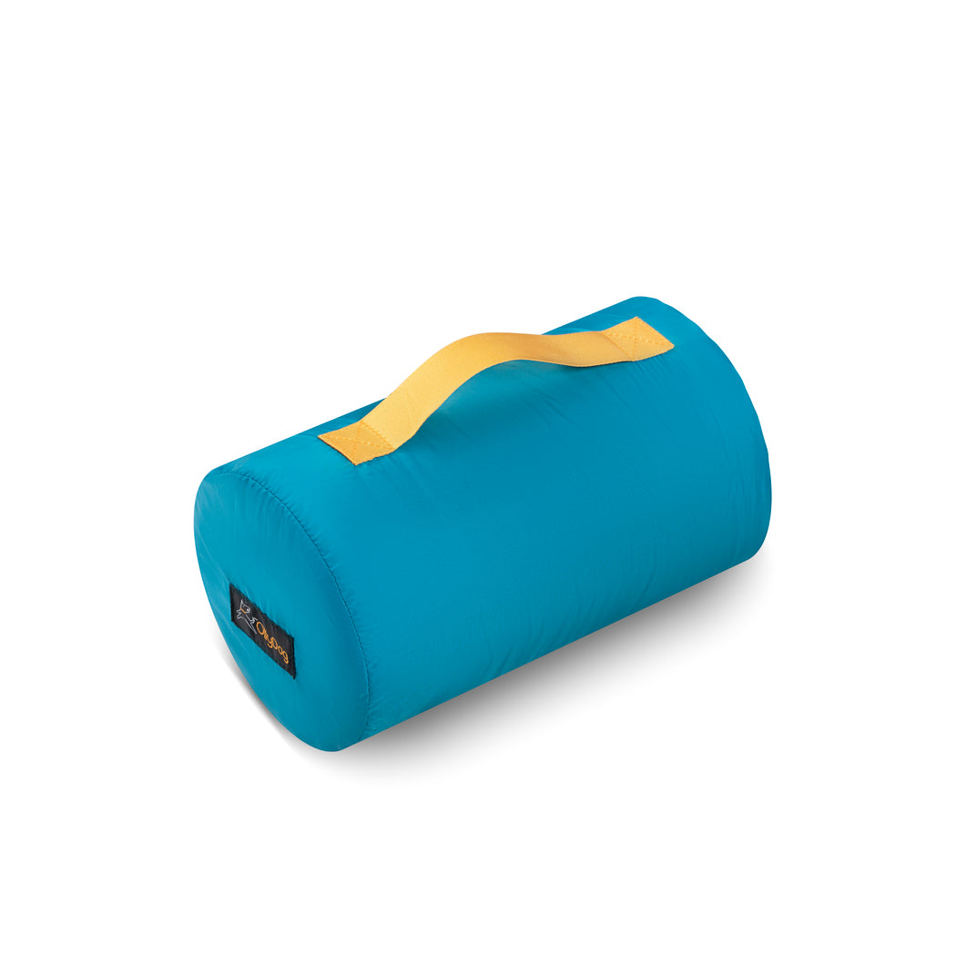 OllyDog Meeker Dog Sleeping Bag rolled up inside its matching teal storage case with yellow handle, showcasing compact and portable design for easy transport