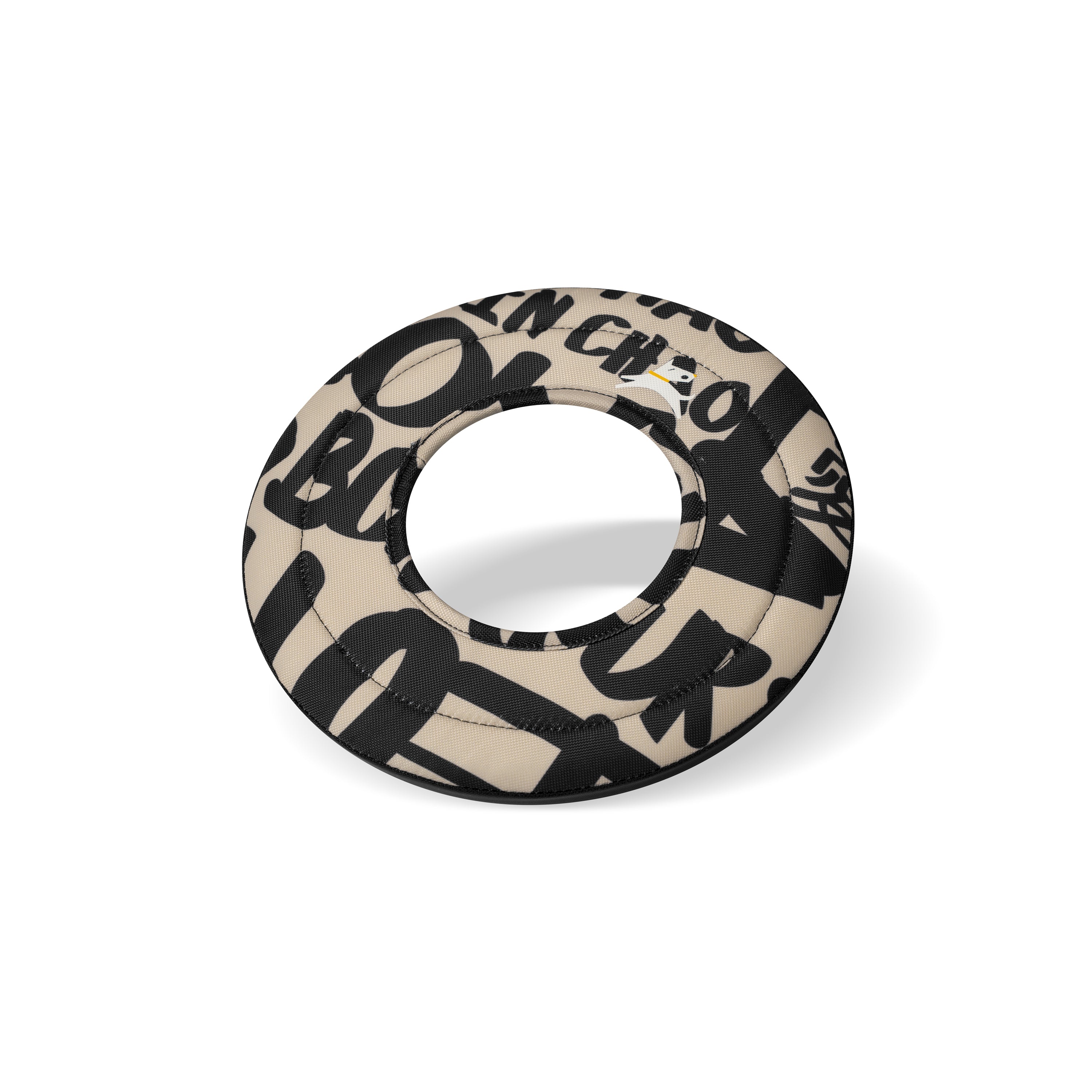 Side-angle view of the OllyDog Mini Super Flyer dog flying disc in ciao typographic print color, highlighting its lightweight, easy-to-grab, and water-compatible recycled polyester design. #color_ciao