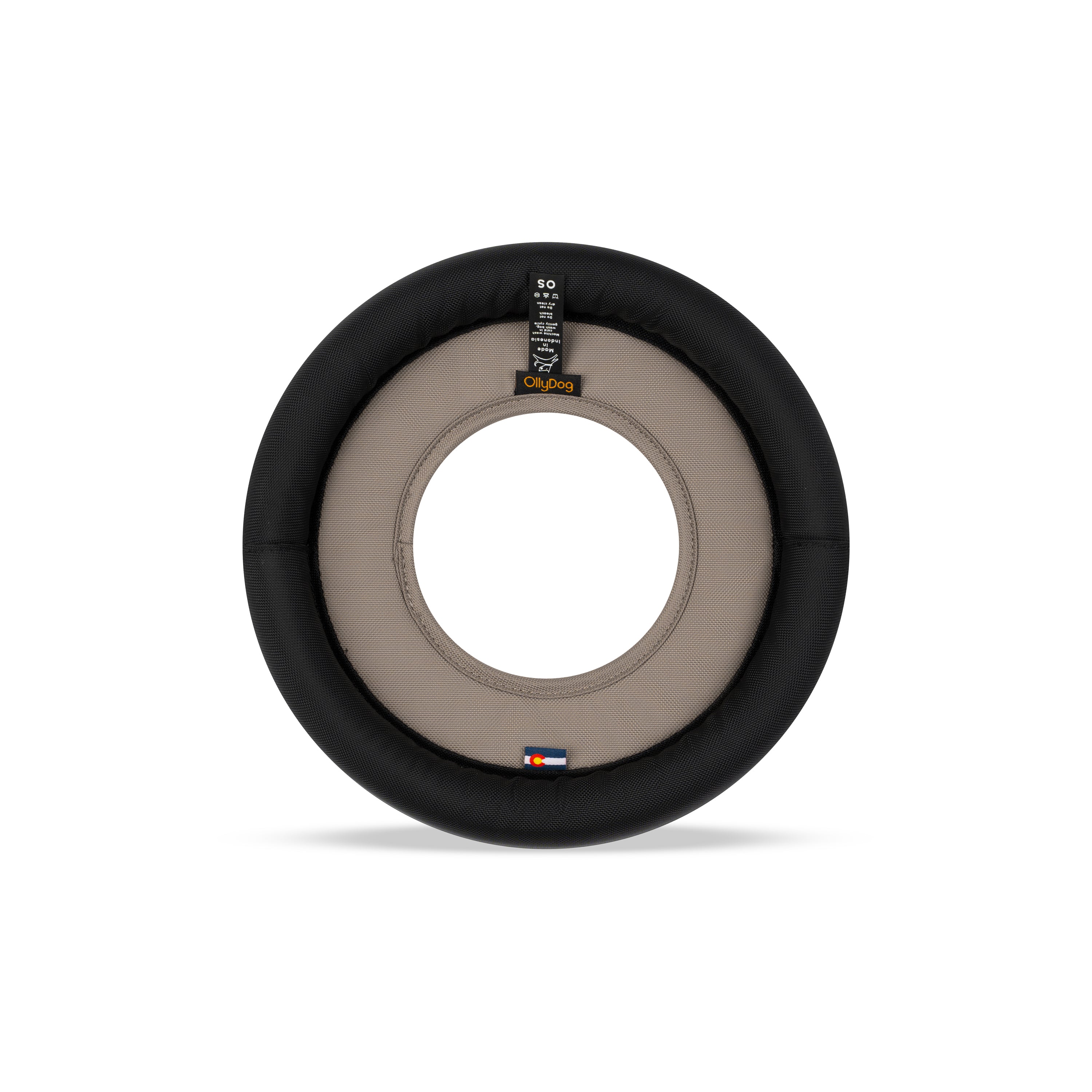 Back view of the OllyDog Mini Super Flyer dog flying disc in dune tan color, highlighting the durable recycled polyester construction and branding details. #color_dune