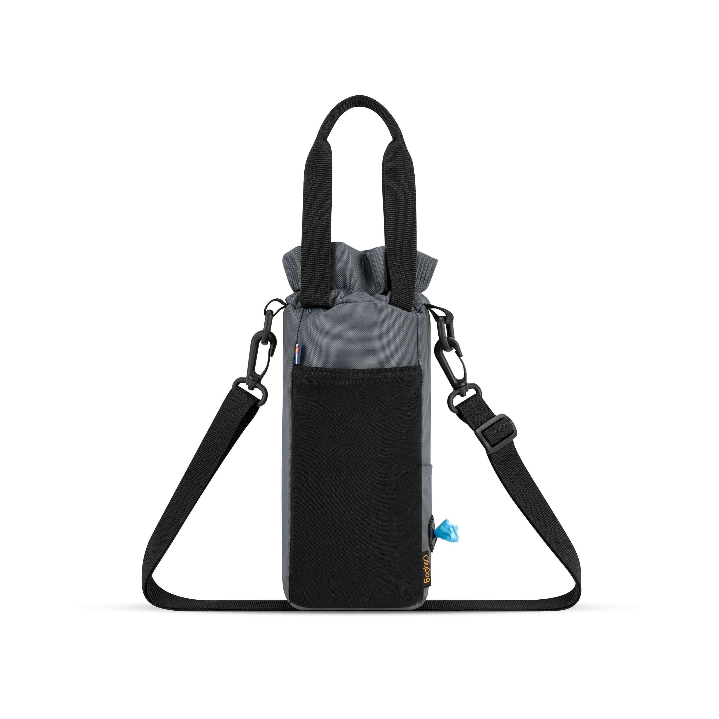Back view of the OllyDog OllyCaddy dog walking carryall in castle rock color, highlighting the convenient back stretch pocket, built-in waste bag dispenser, grip handles, and adjustable crossbody strap. #color_castle rock
