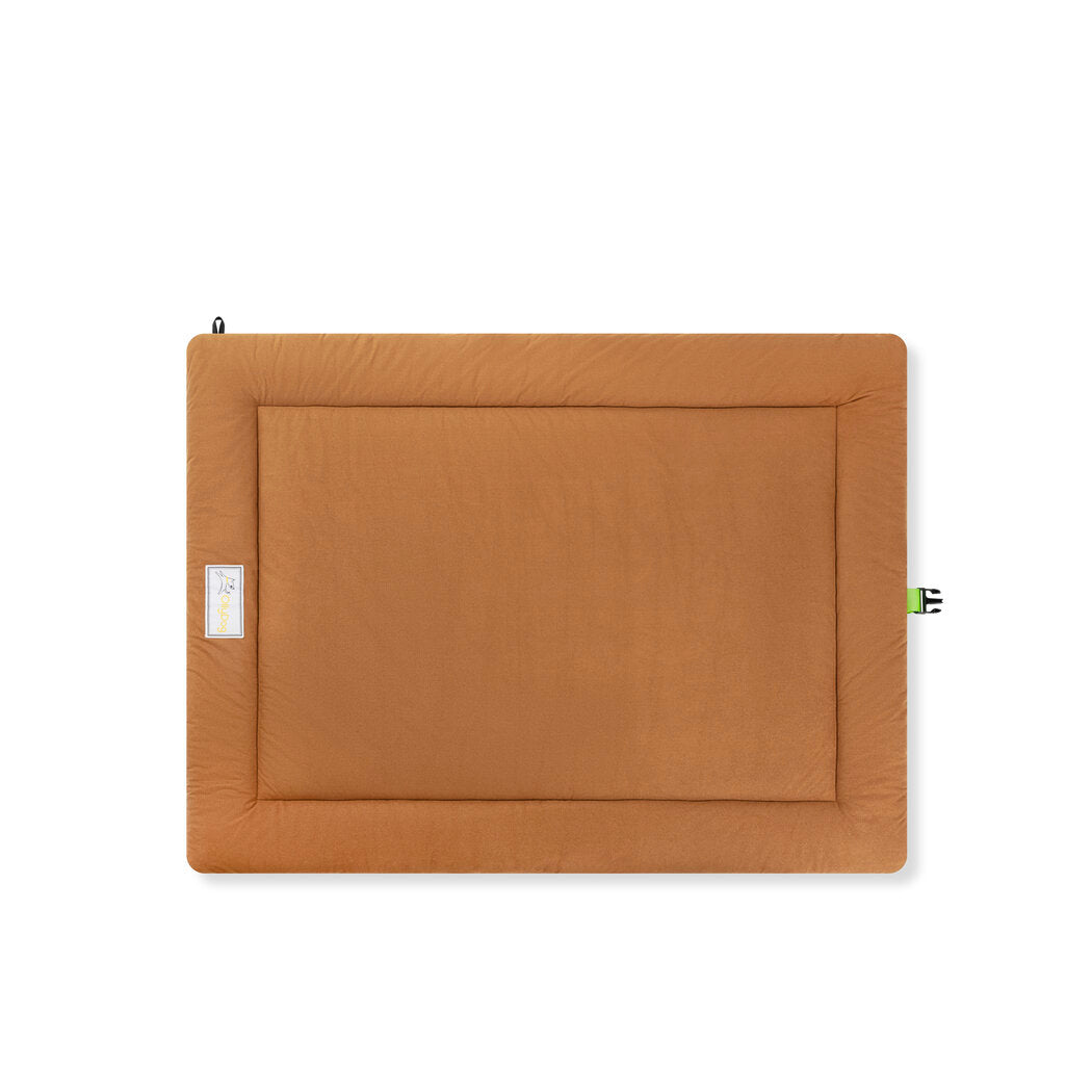 Flat lay of the OllyDog Ridgeway Travel Bed in Chestnut color. The rectangular, lightweight dog bed features soft, durable microfleece and water-resistant material with an attached buckle for easy rolling and securing. Measures 36 x 48 inches #color_chestnut