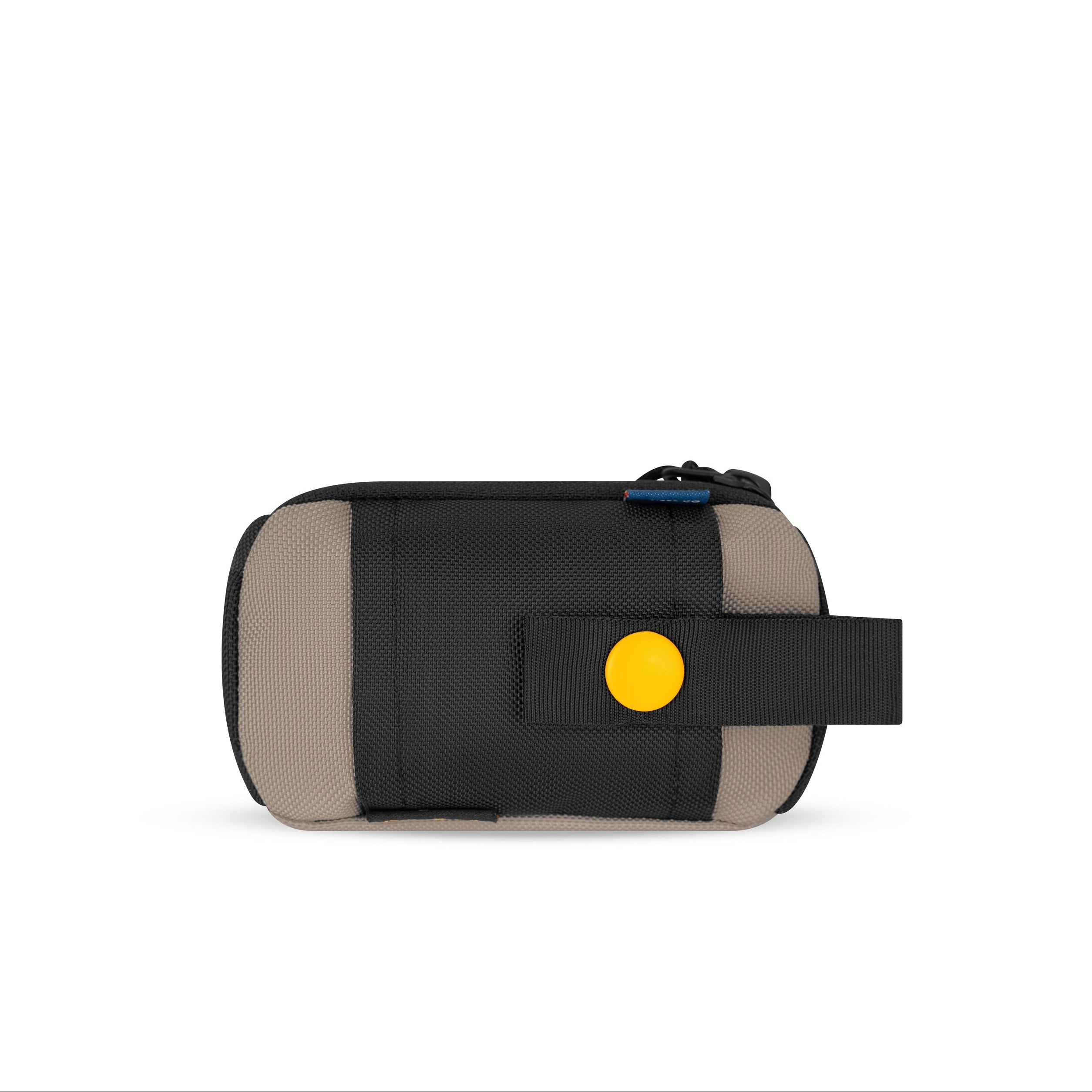 Back view of the OllyDog Scoop Pick Up Bag in dune color, highlighting the snap closure and slide-on attachment loop for easy attachment to any leash. #color_dune