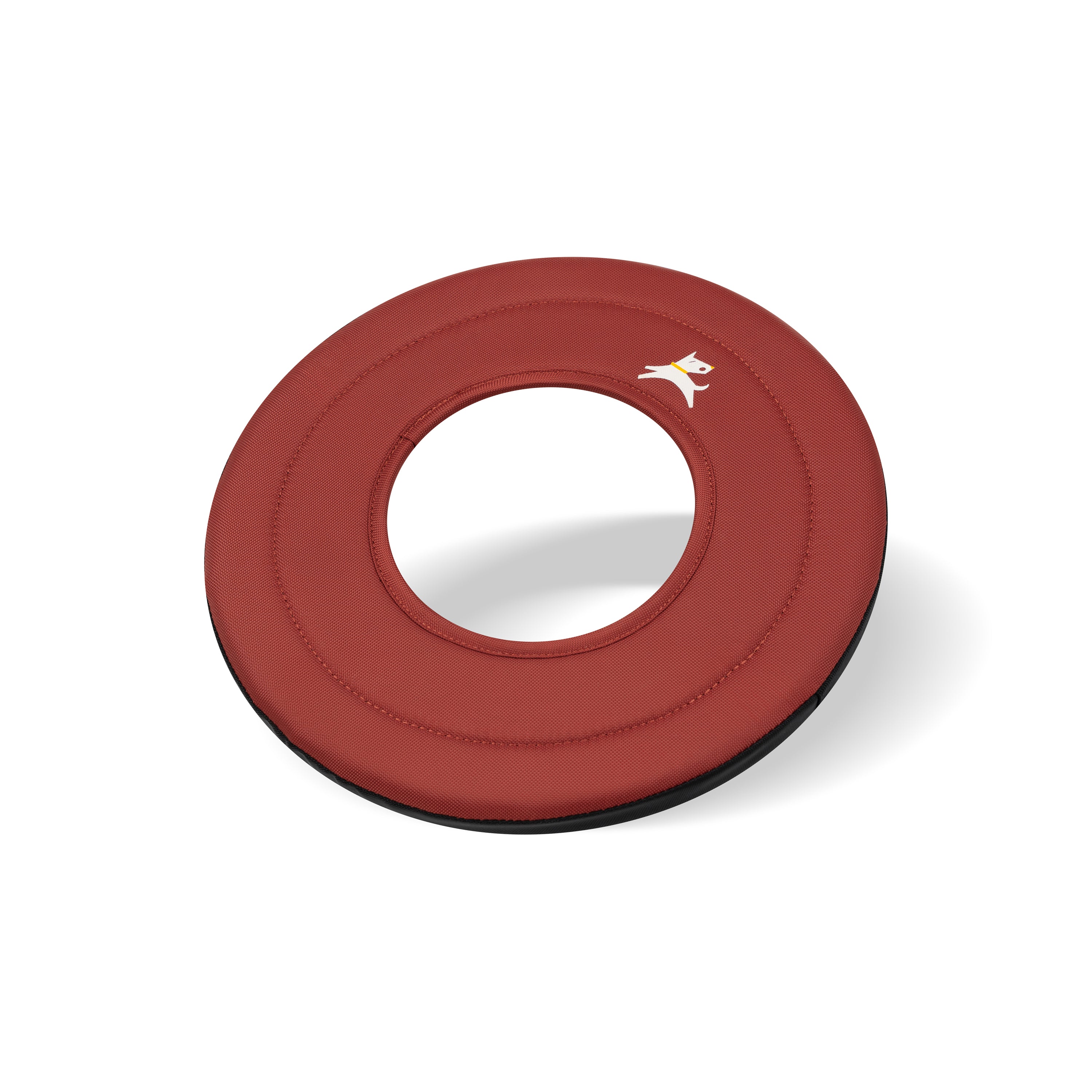 Side-angle view of the OllyDog Super Flyer dog flying disc in cider red color, highlighting its lightweight, easy-to-grab, and water-compatible recycled polyester design.#color_cider