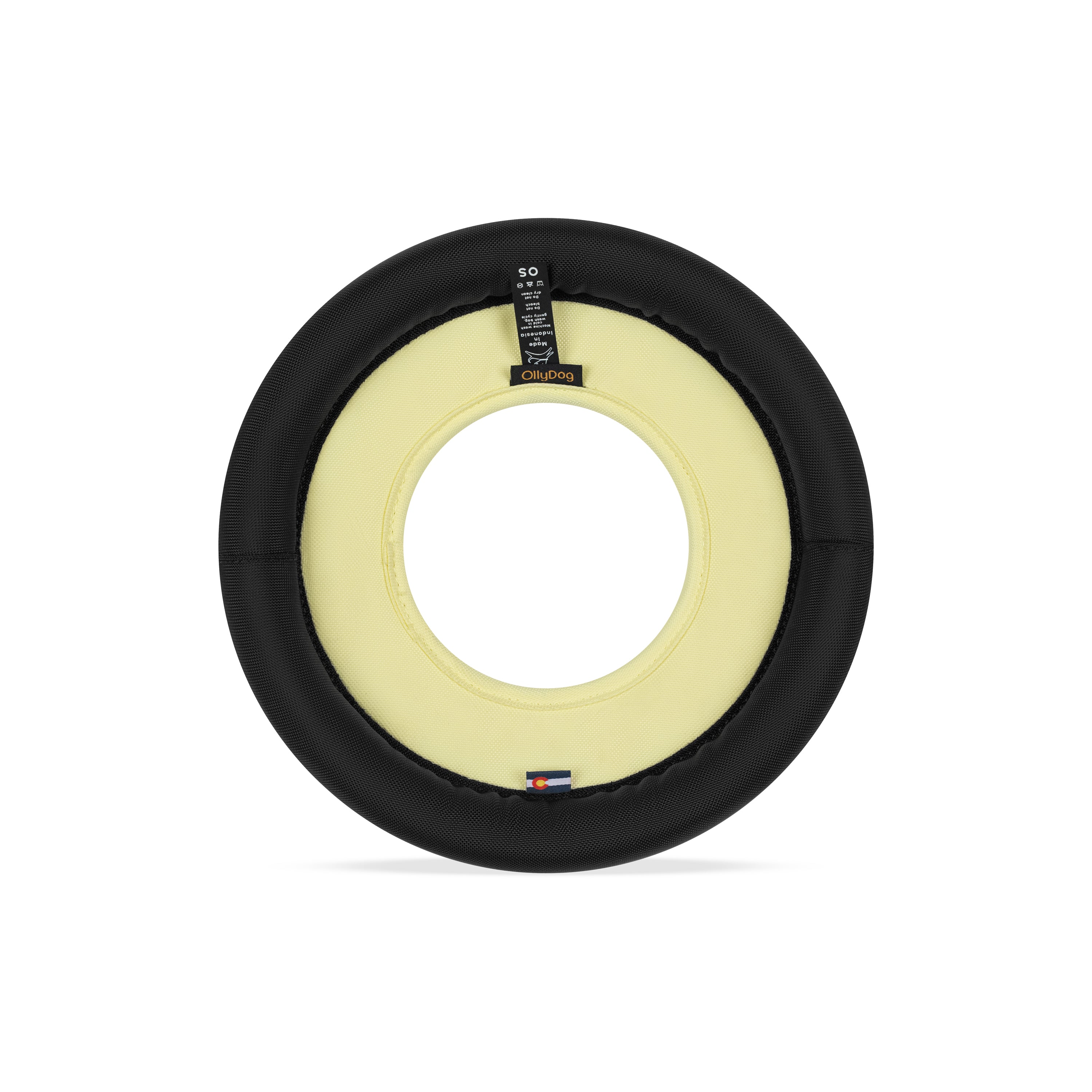 Back view of the OllyDog Super Flyer dog flying disc in sol color, highlighting the durable recycled polyester construction and branding details.#color_sol