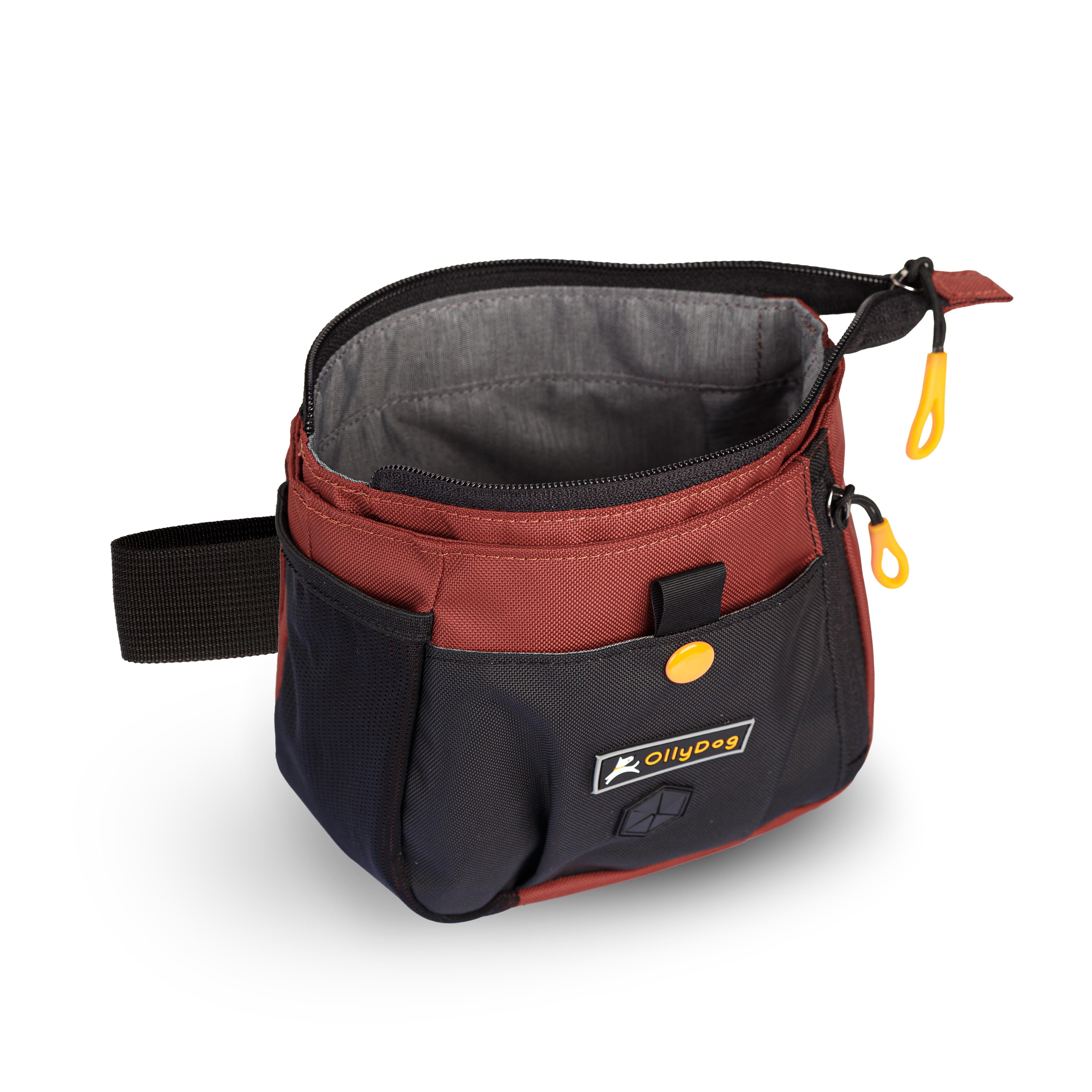 Opened view of OllyDog’s Backcountry Day Bag in Cider, a dog training tool designed for quick access to treats, ideal for rewarding good behavior. With a spacious compartment for storage, this practical dog hiking gear is perfect for convenient training while exploring dog friendly trails. #color_cider