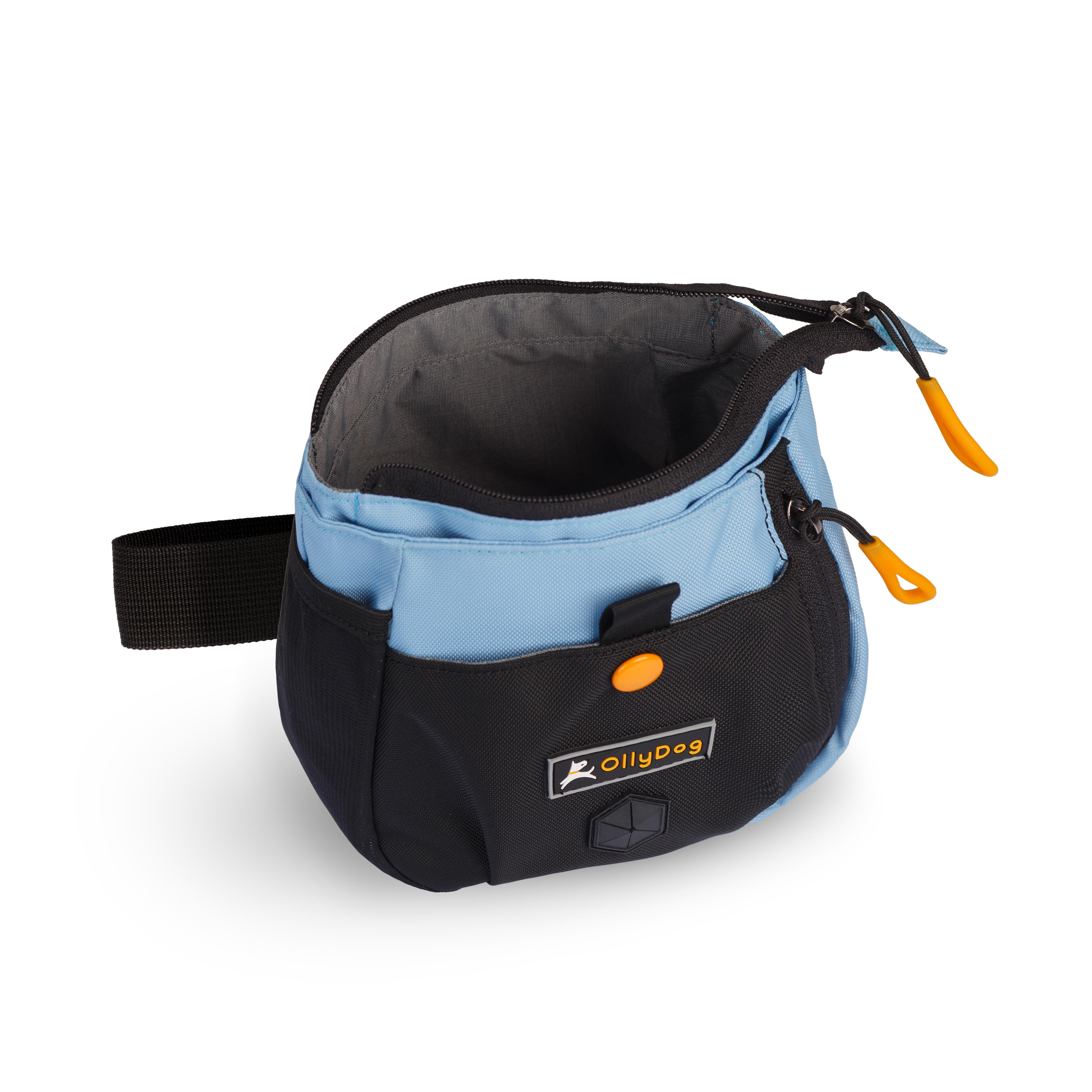 Opened view of OllyDog’s Backcountry Day Bag in Maui Blue, a dog training tool designed for quick access to treats, ideal for rewarding good behavior. With a spacious compartment for storage, this practical dog hiking gear is perfect for convenient training while exploring dog friendly trails. #color_maui blue