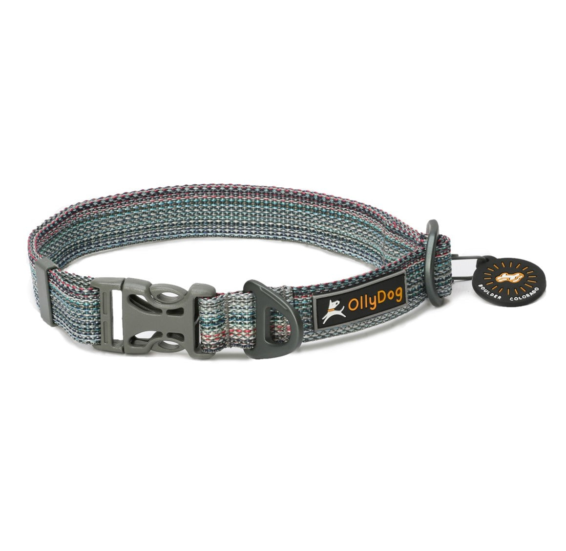 Side view of the OllyDog Rescue Dog Collar in Prism color, made from multicolored recycled webbing. Features include a gray side-release buckle, aluminum D-ring, and a black silicone tag silencer with Boulder Colorado branding #color_prism