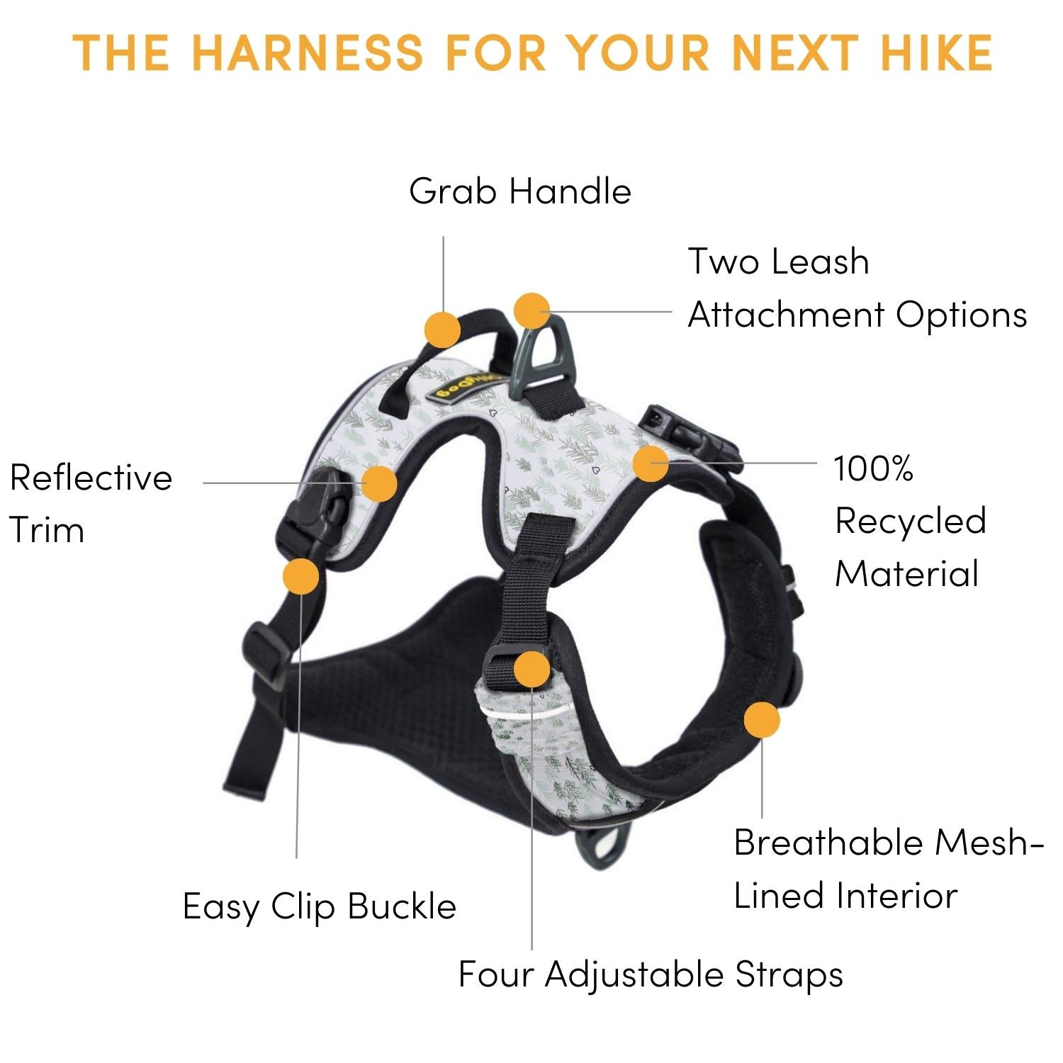 Infographic banner detailing features of the OllyDog Alpine Reflective Harness in tree hugger print, highlighting a grab handle, two leash attachment options, 100% recycled material, breathable mesh-lined interior, four adjustable straps, easy clip buckles, and reflective trim. #color_tree hugger print